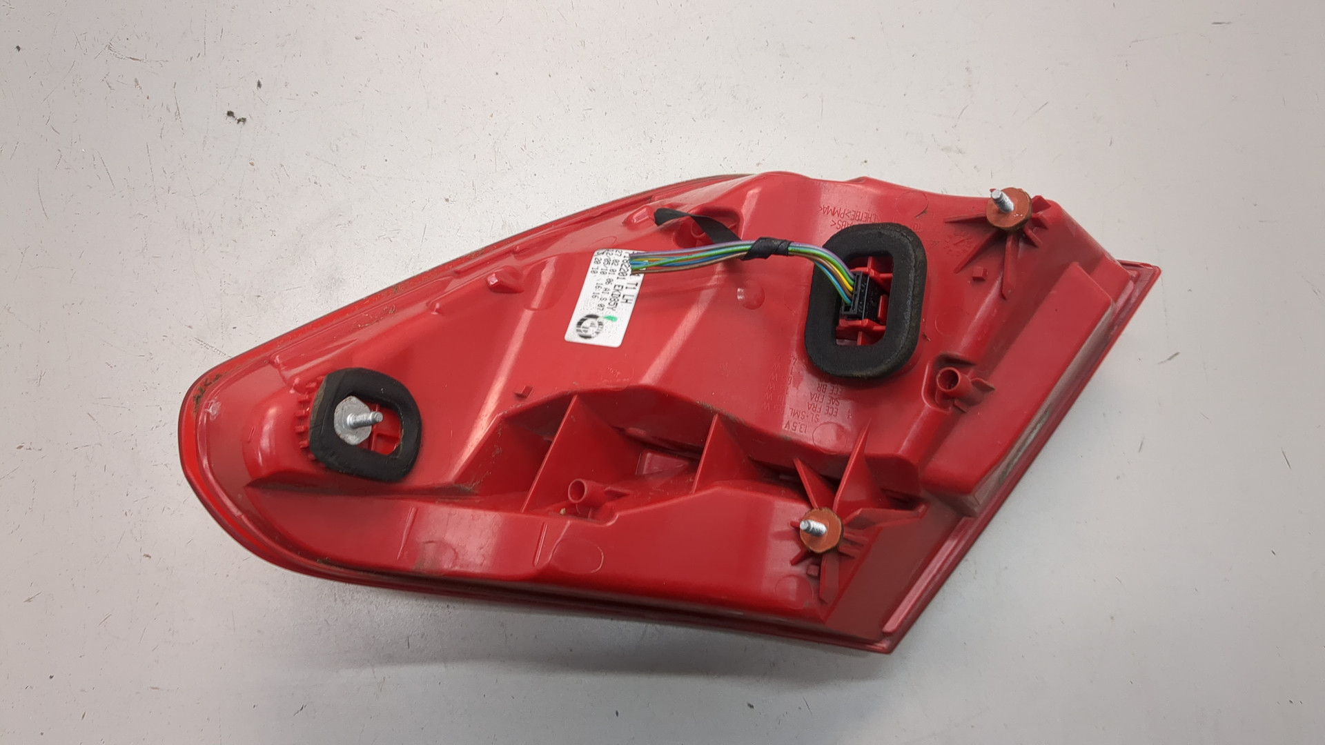 Фонарь задний левый