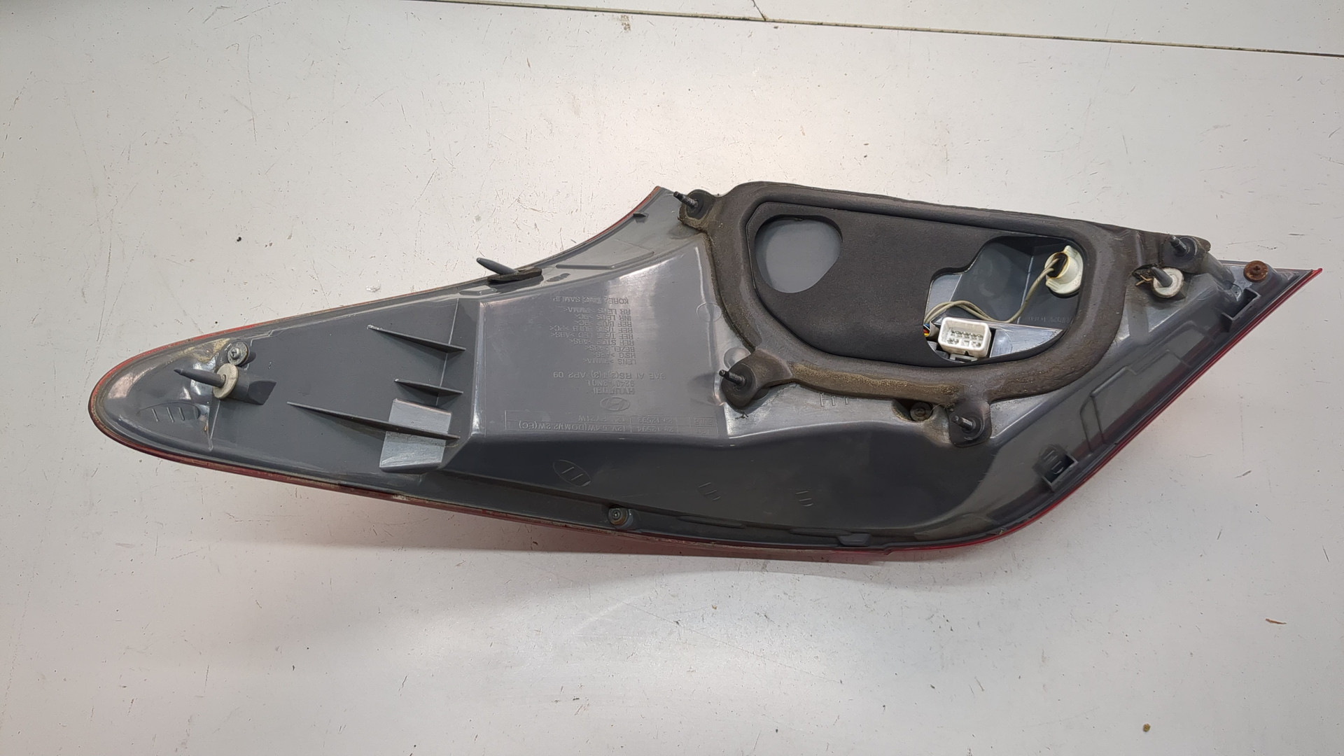 Фонарь задний левый