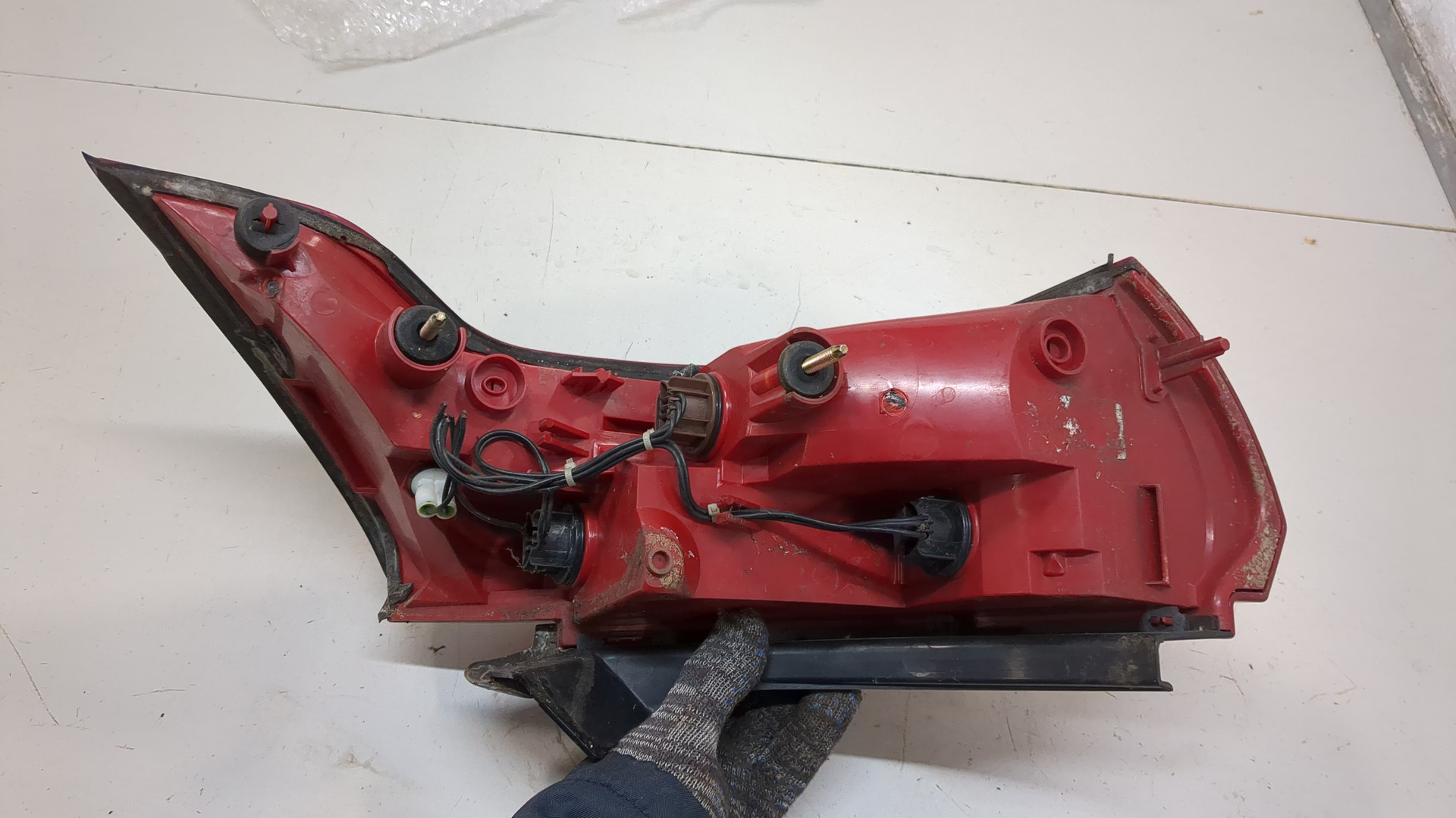 Фонарь задний левый