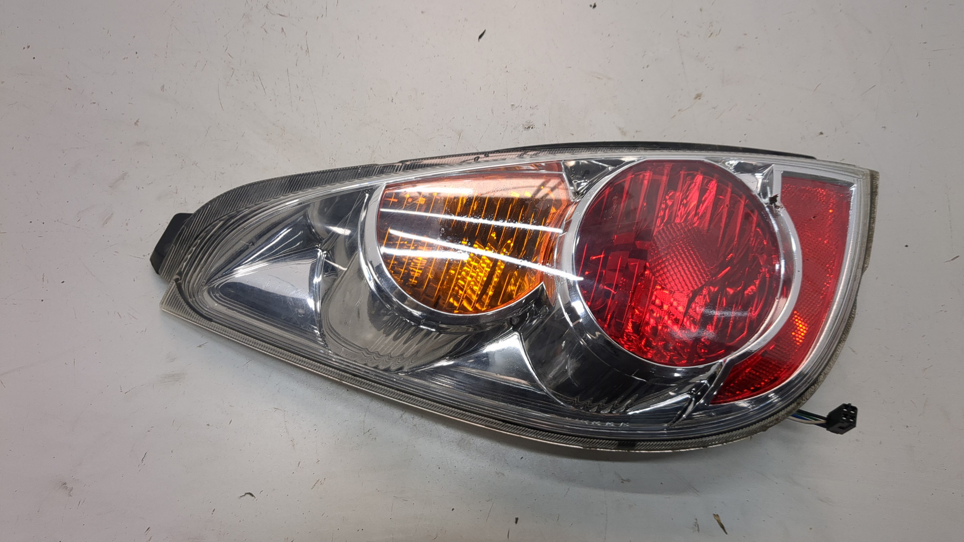 Фонарь задний левый