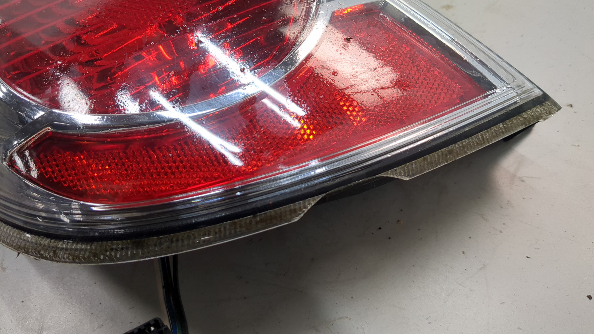 Фонарь задний левый