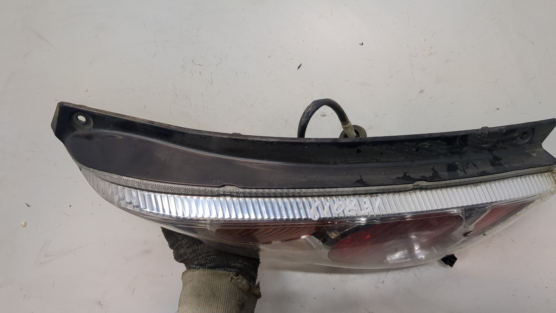 Фонарь задний левый