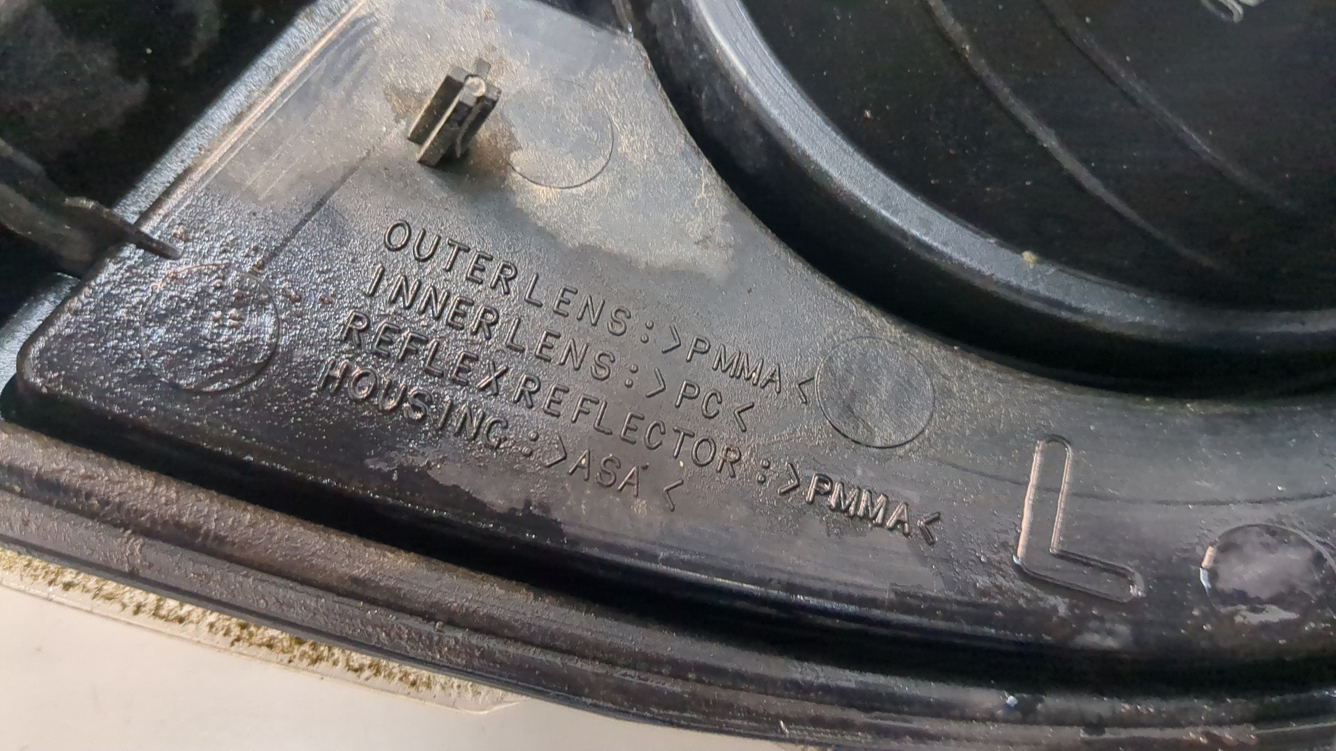 Фонарь задний левый