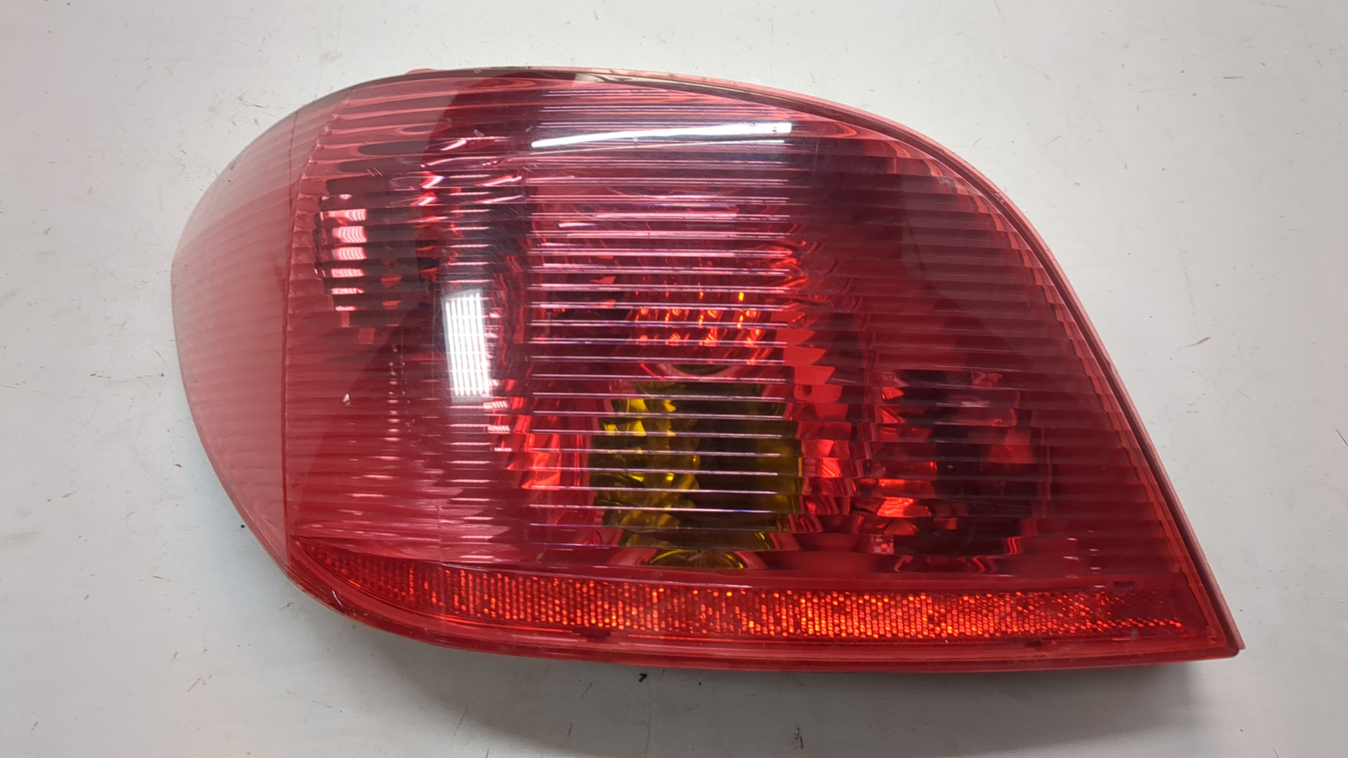 Фонарь задний левый