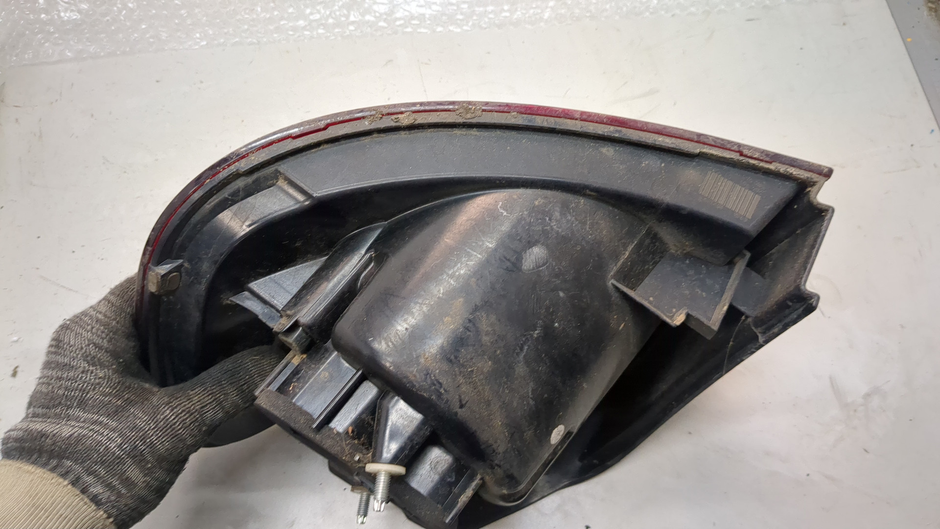 Фонарь задний левый