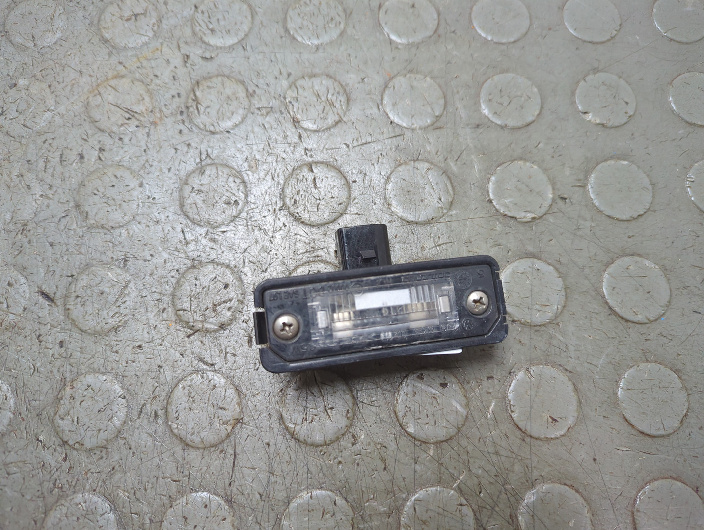 Фонарь подсветки номера