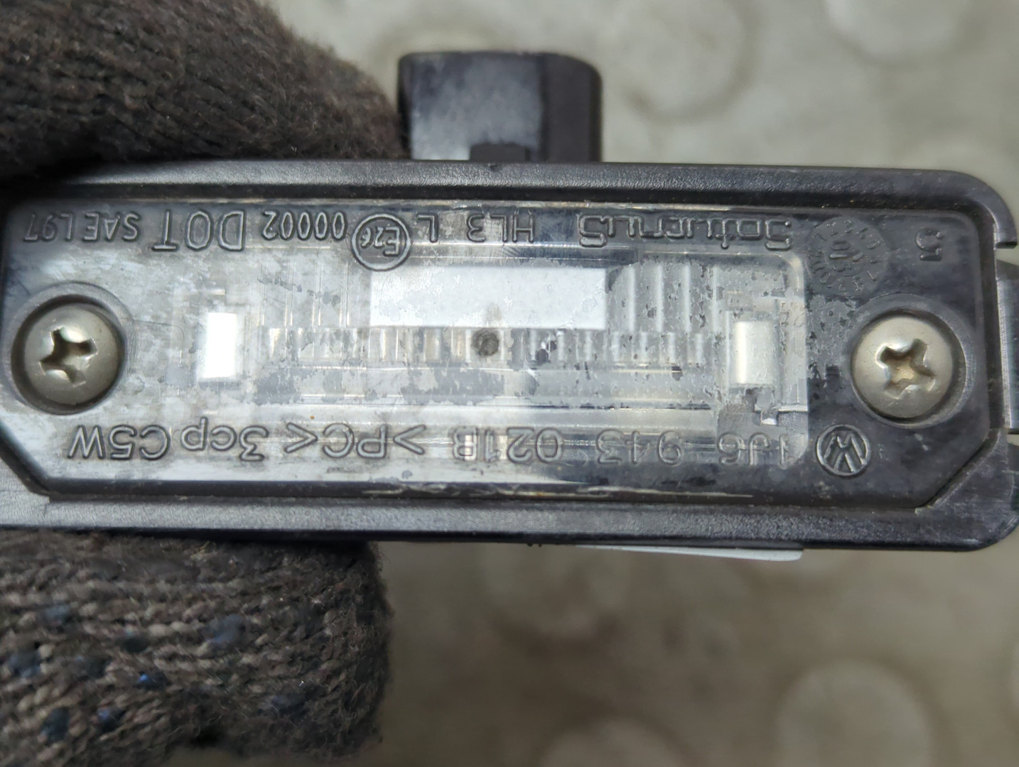 Фонарь подсветки номера