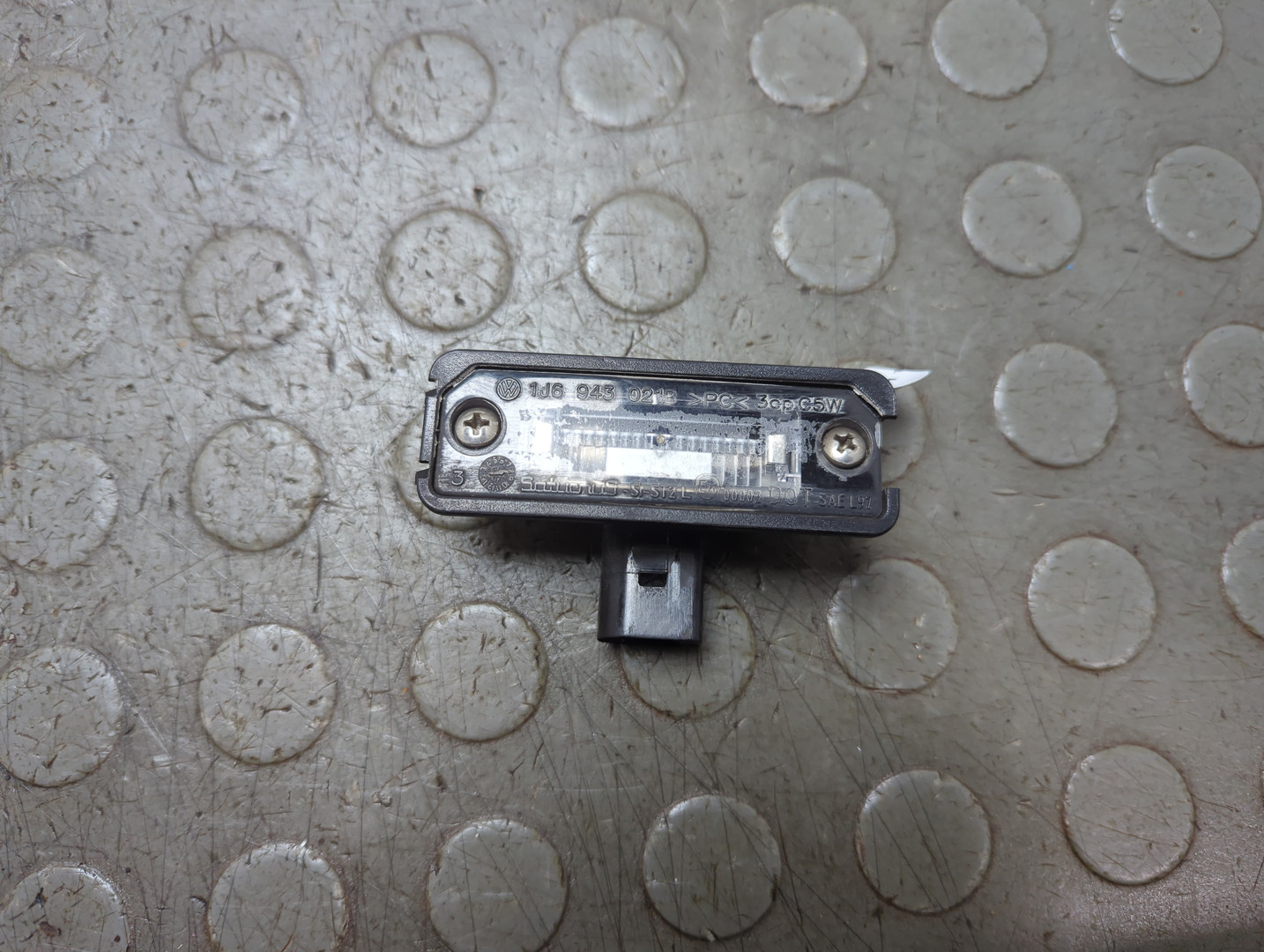 Фонарь подсветки номера