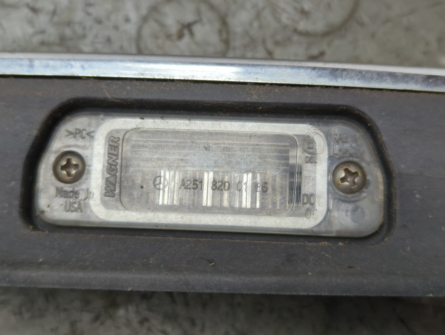 Фонарь подсветки номера