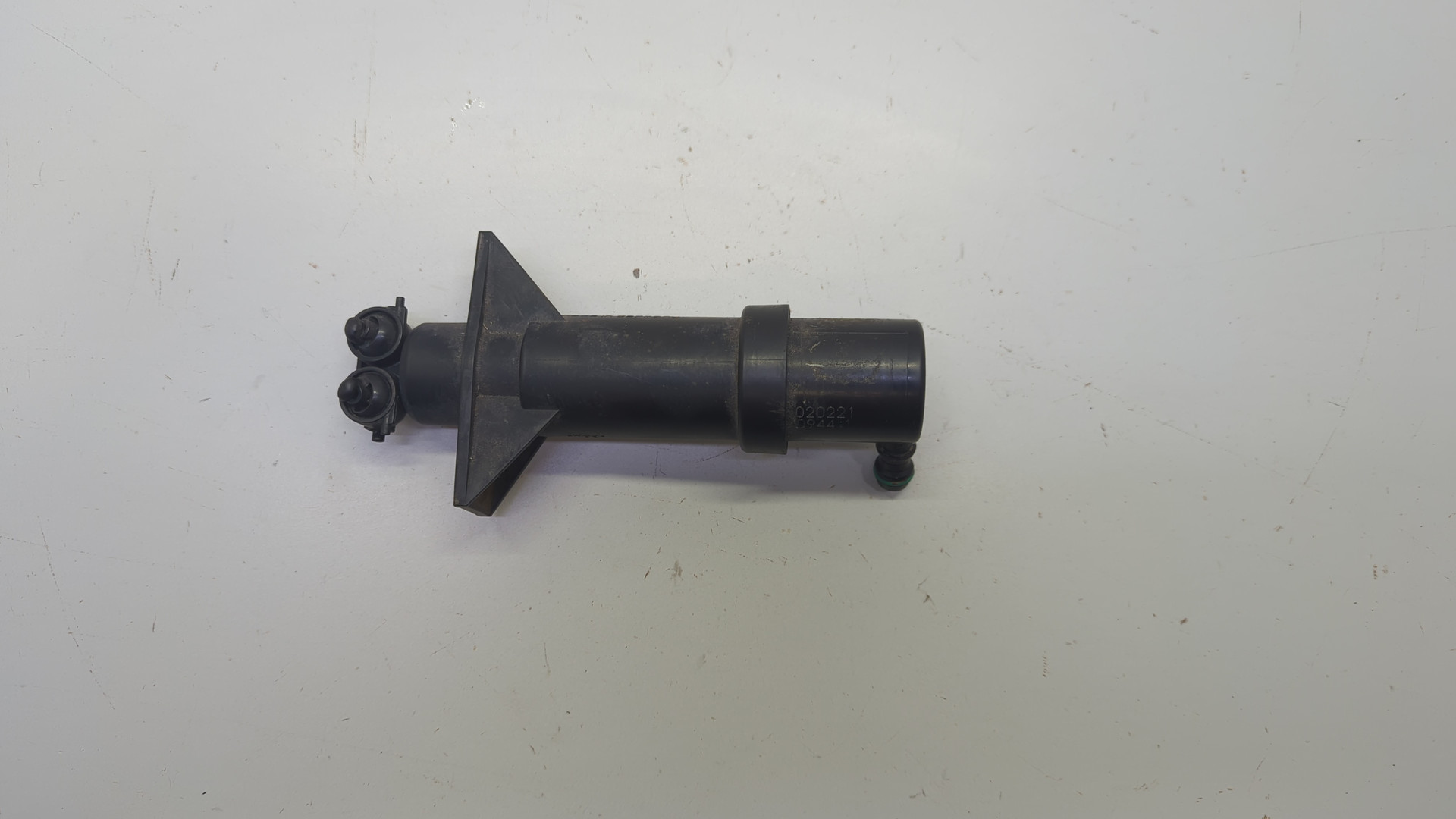 Форсунка омывателя фары