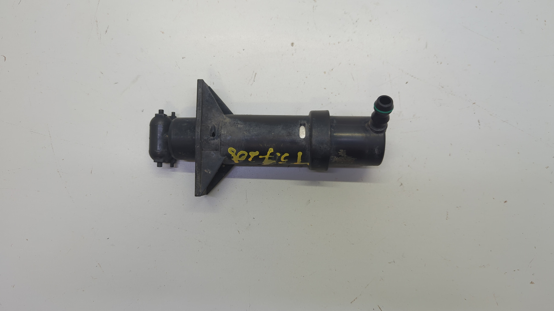 Форсунка омывателя фары