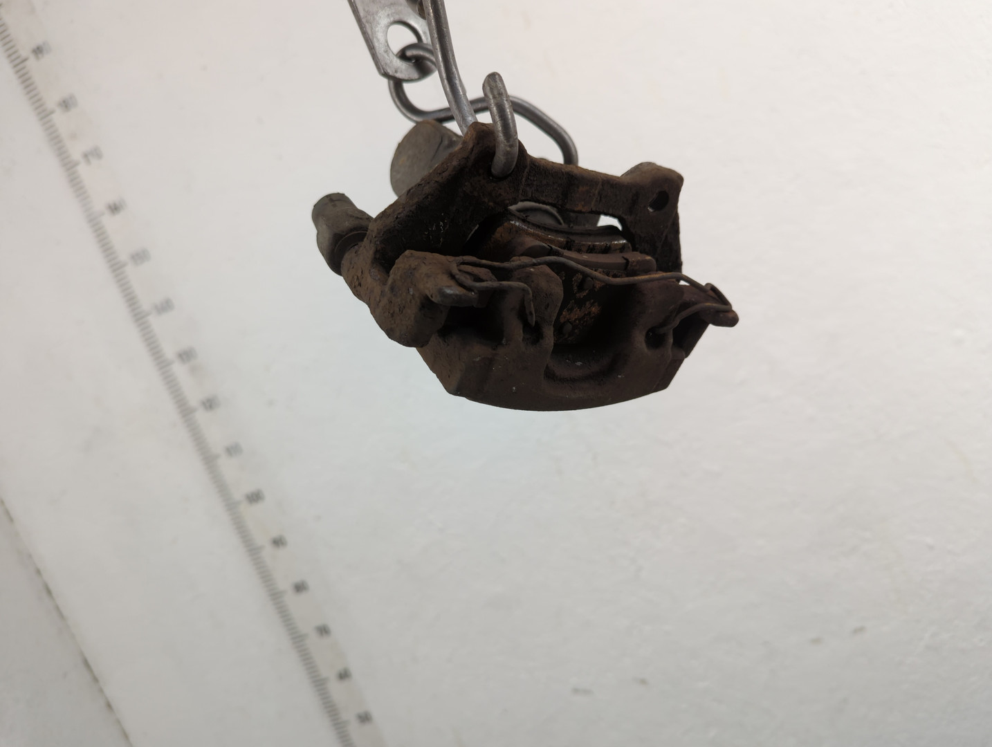 Суппорт задний левый