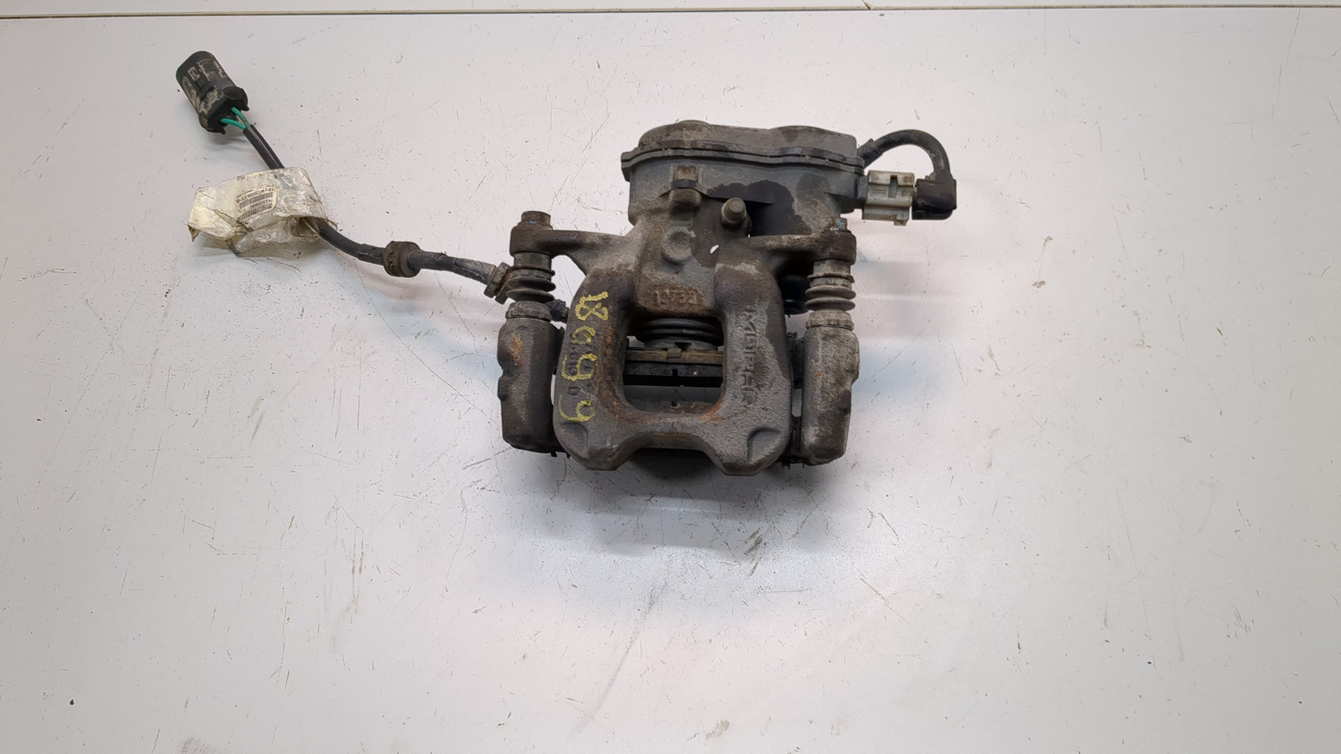 Суппорт задний левый