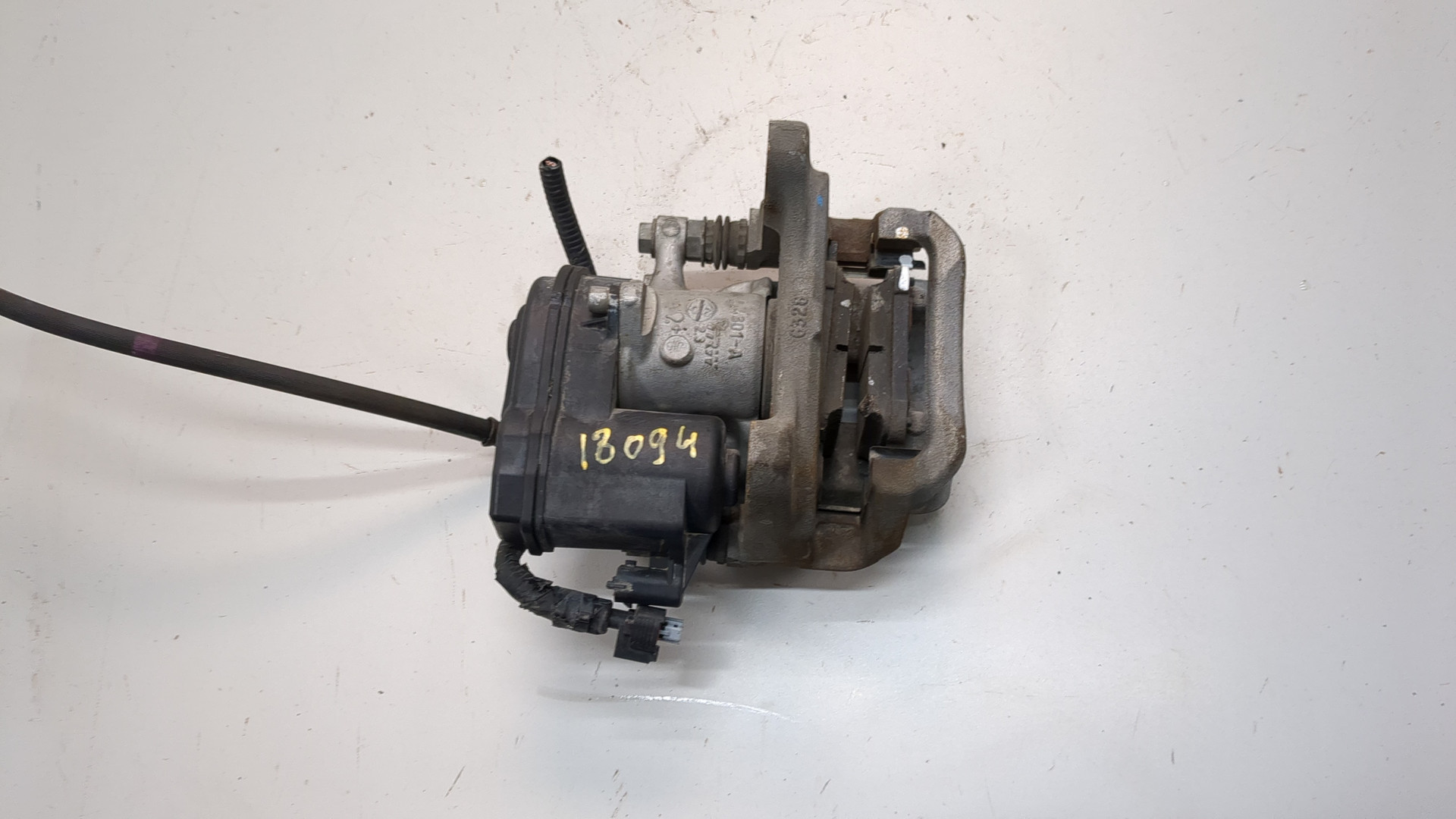 Суппорт задний левый