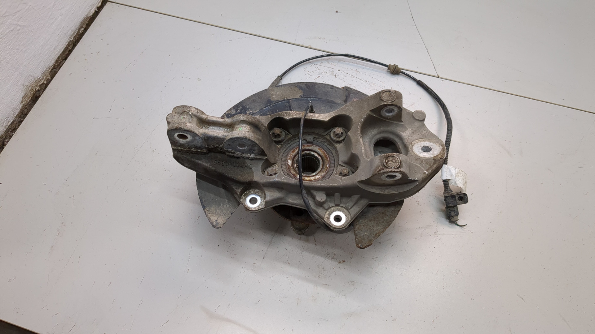 Кулак поворотный задний левый