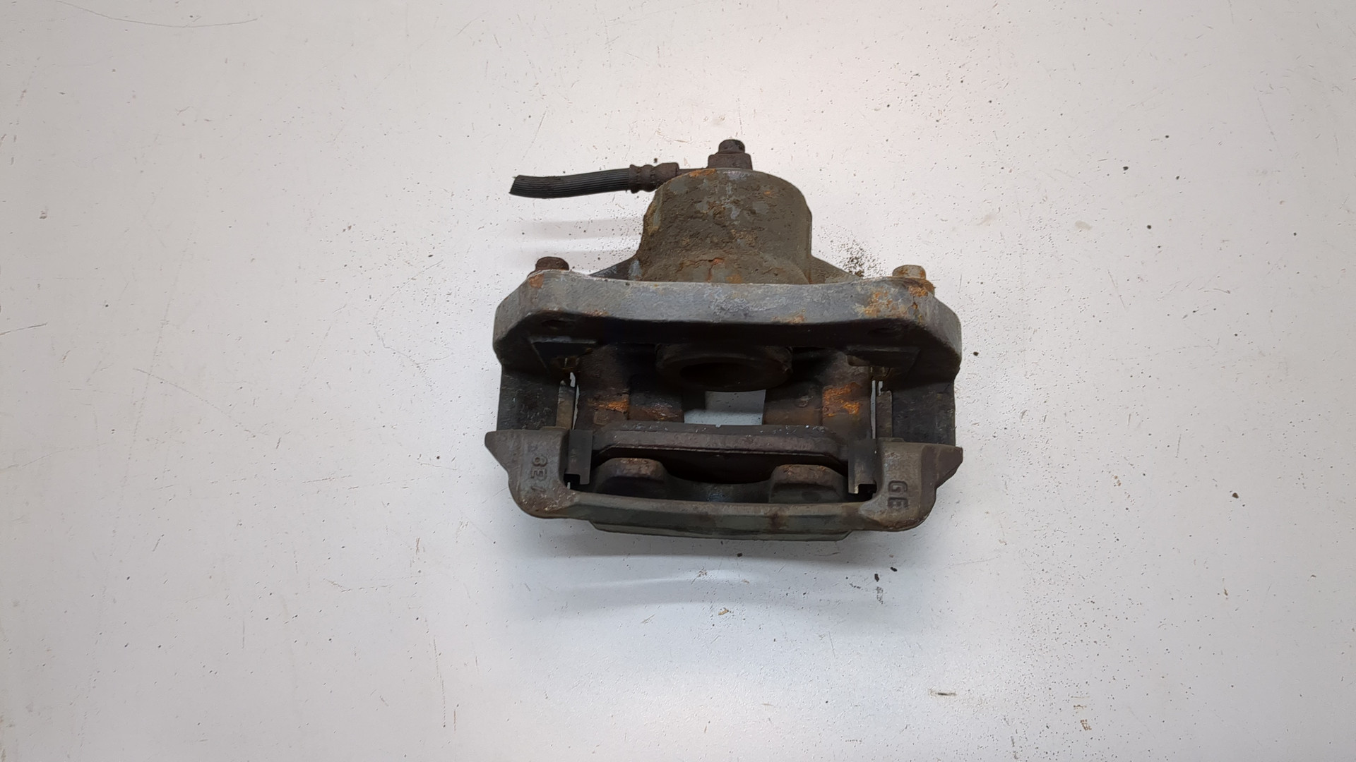 Суппорт передний левый