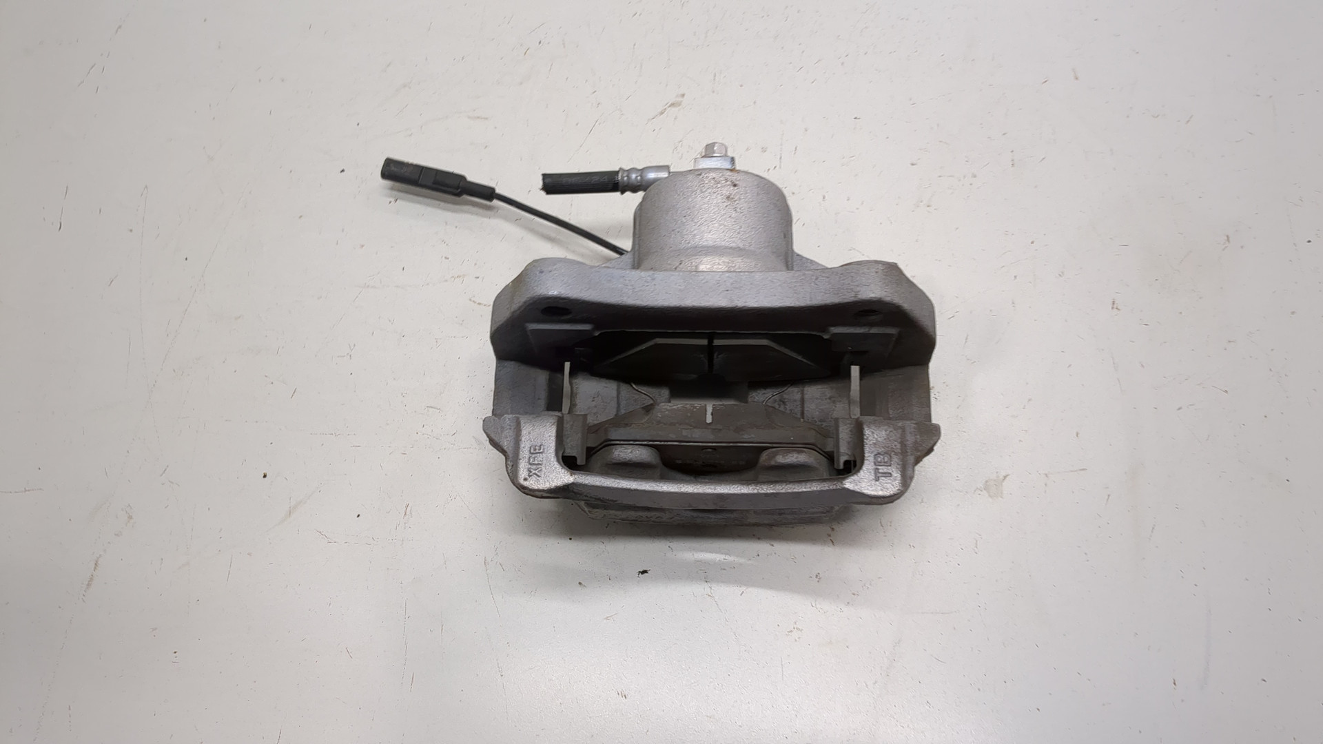 Суппорт передний левый