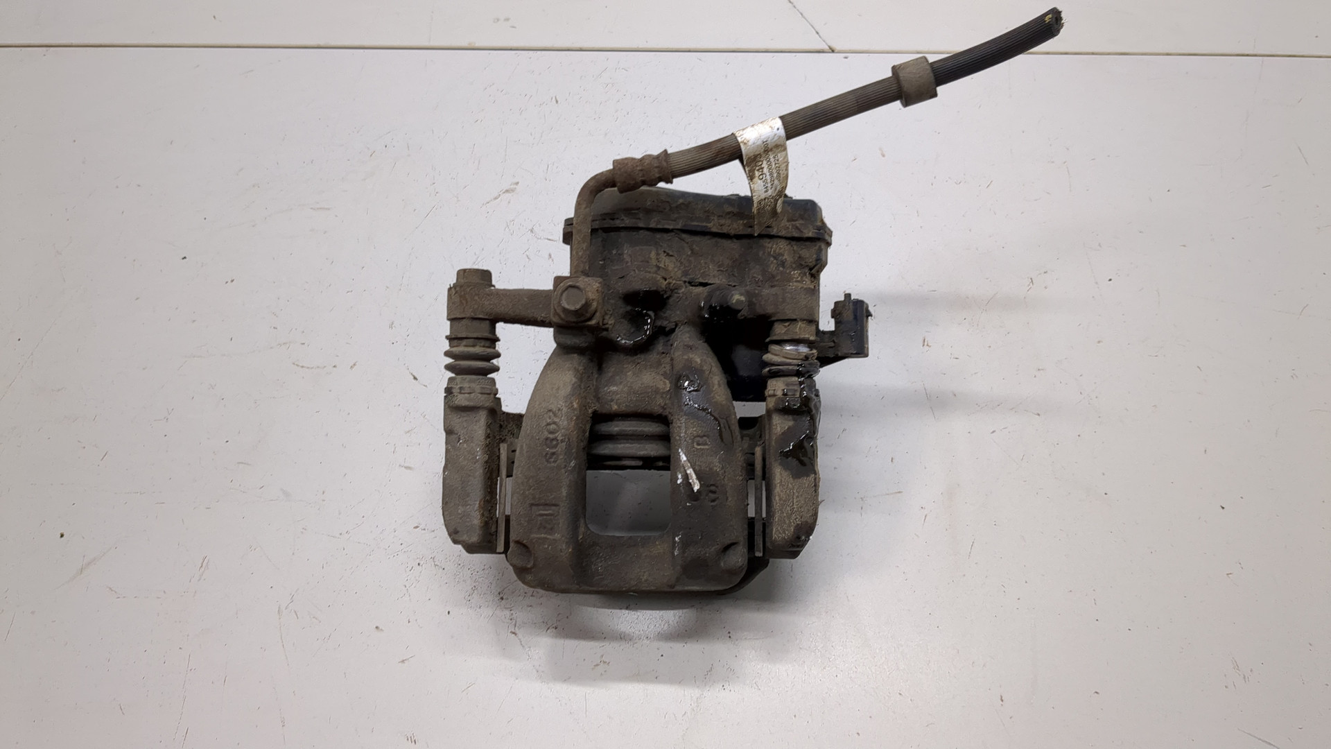 Суппорт задний левый