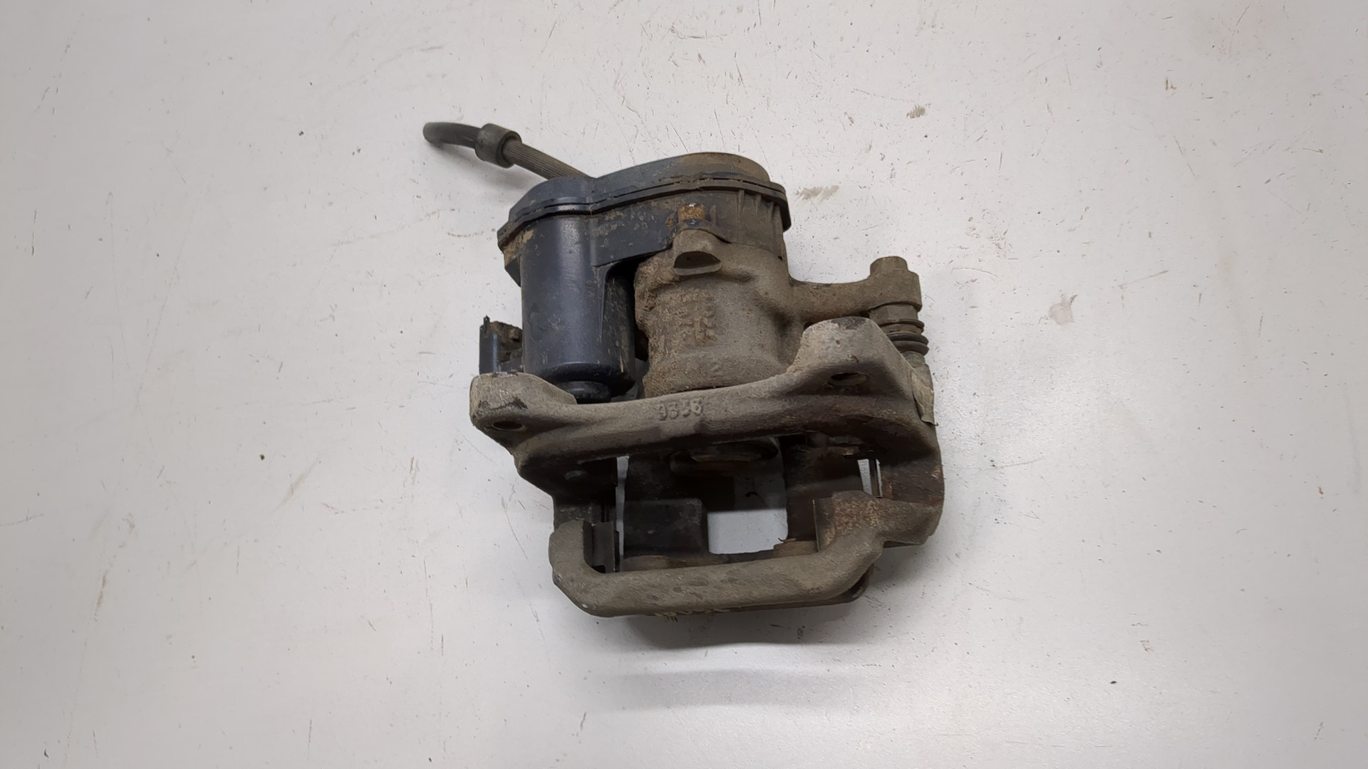 Суппорт задний левый