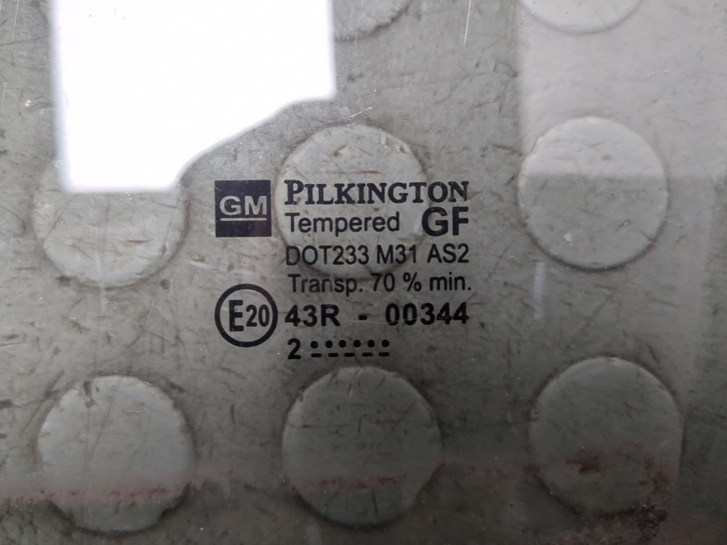 Стекло двери передней левой