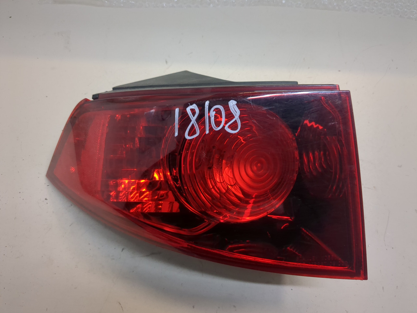 Фонарь задний левый