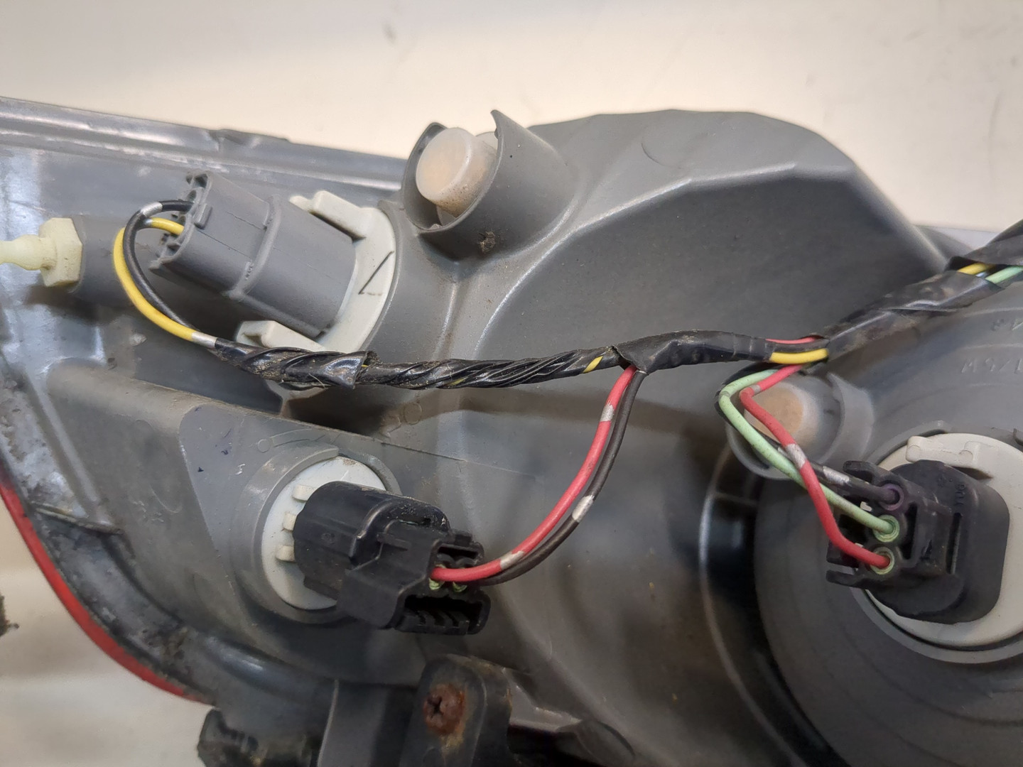 Фонарь задний левый