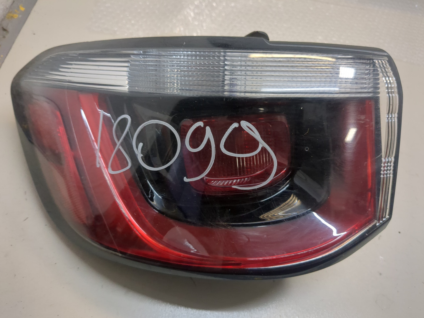 Фонарь задний левый