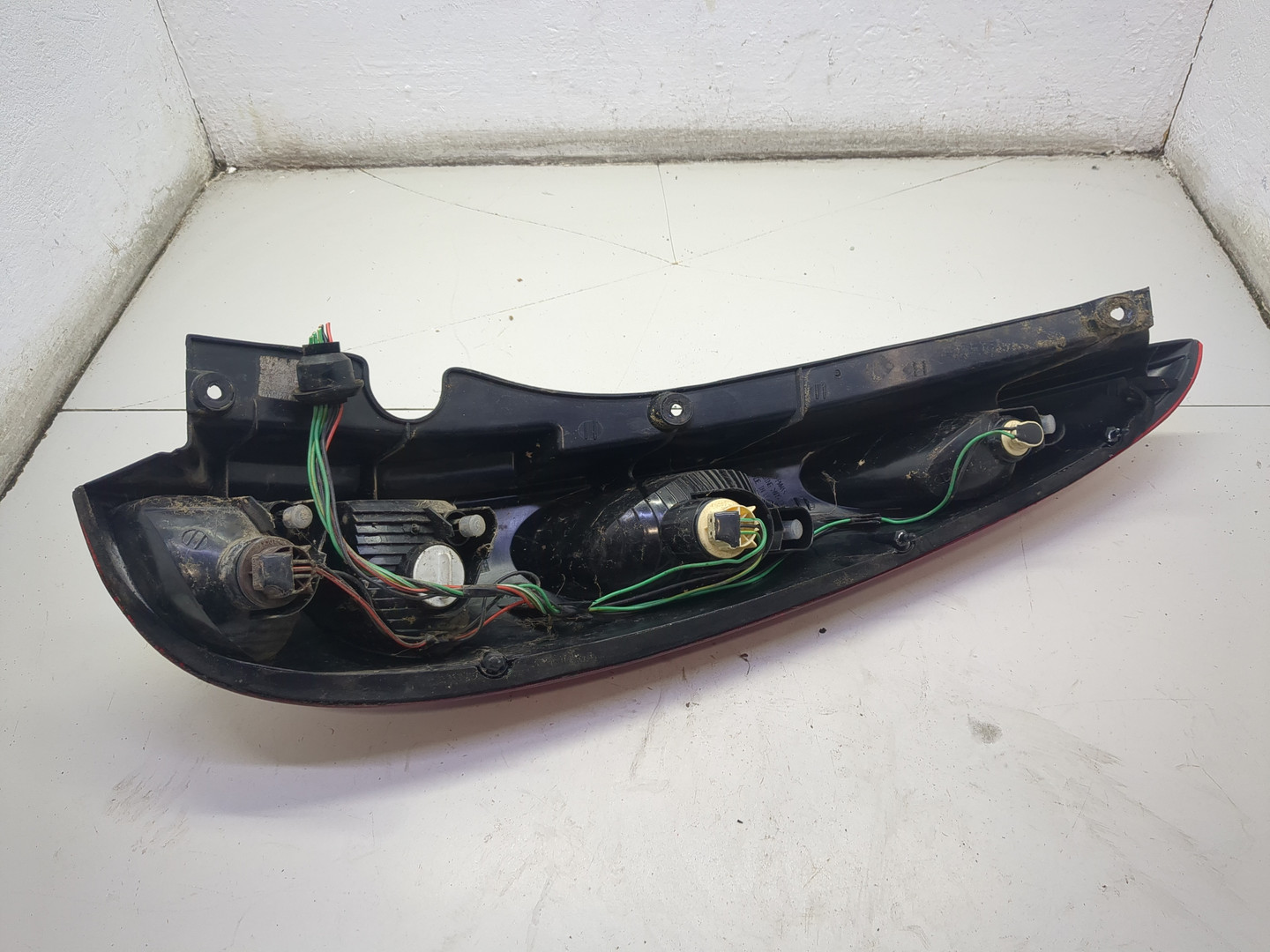 Фонарь задний левый