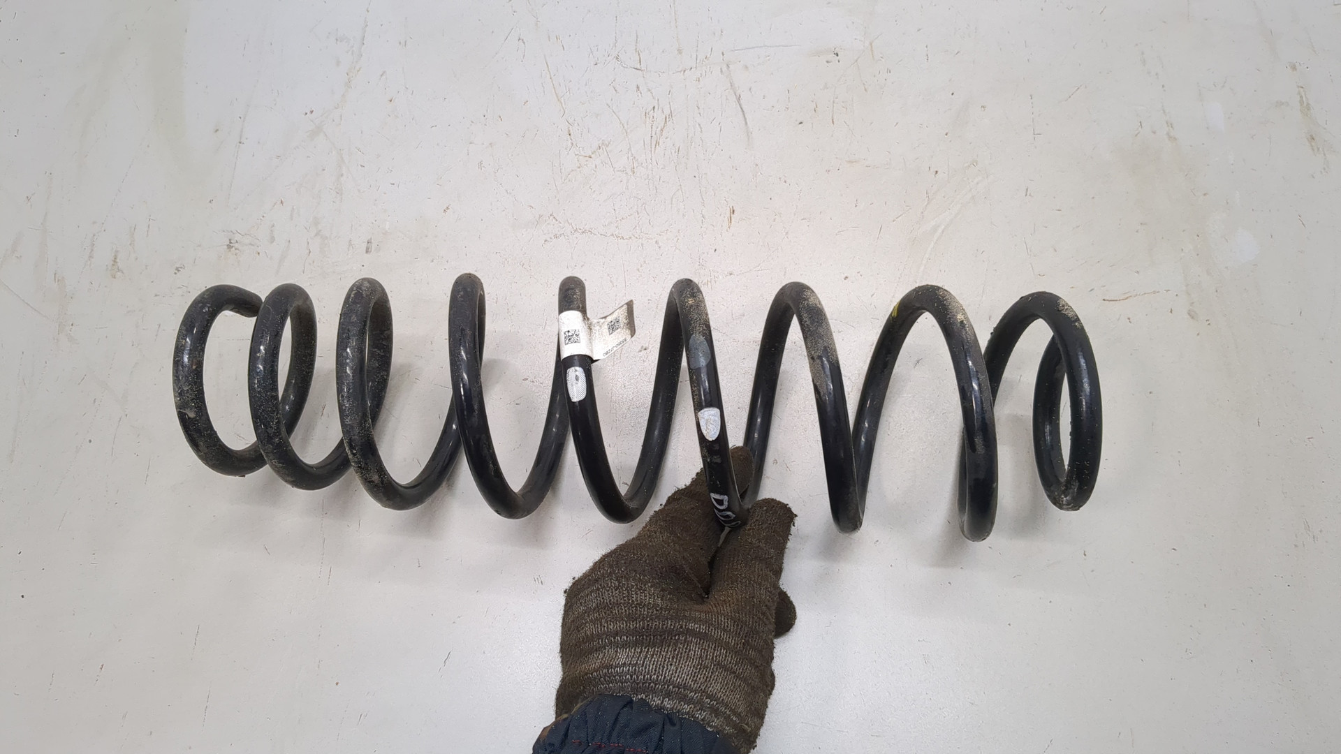 Пружина задняя