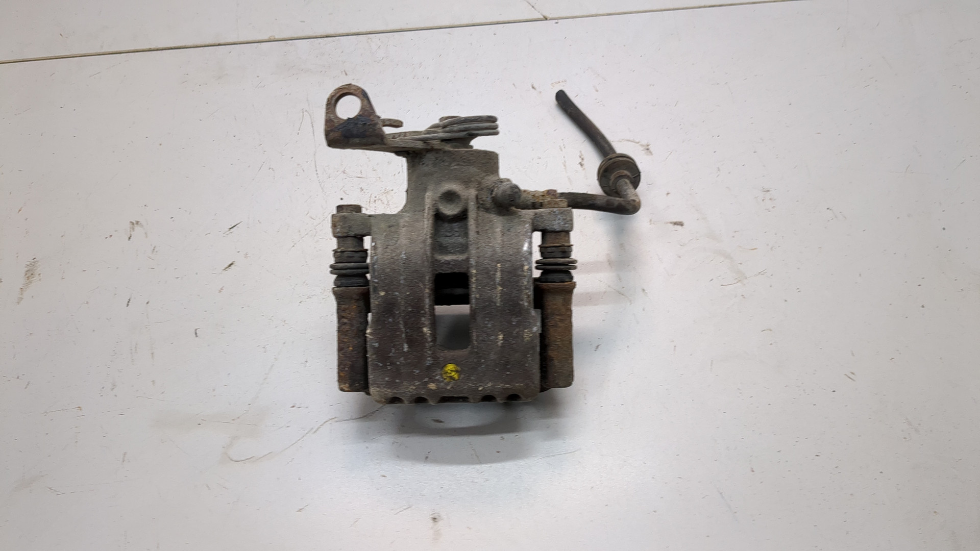 Суппорт задний левый