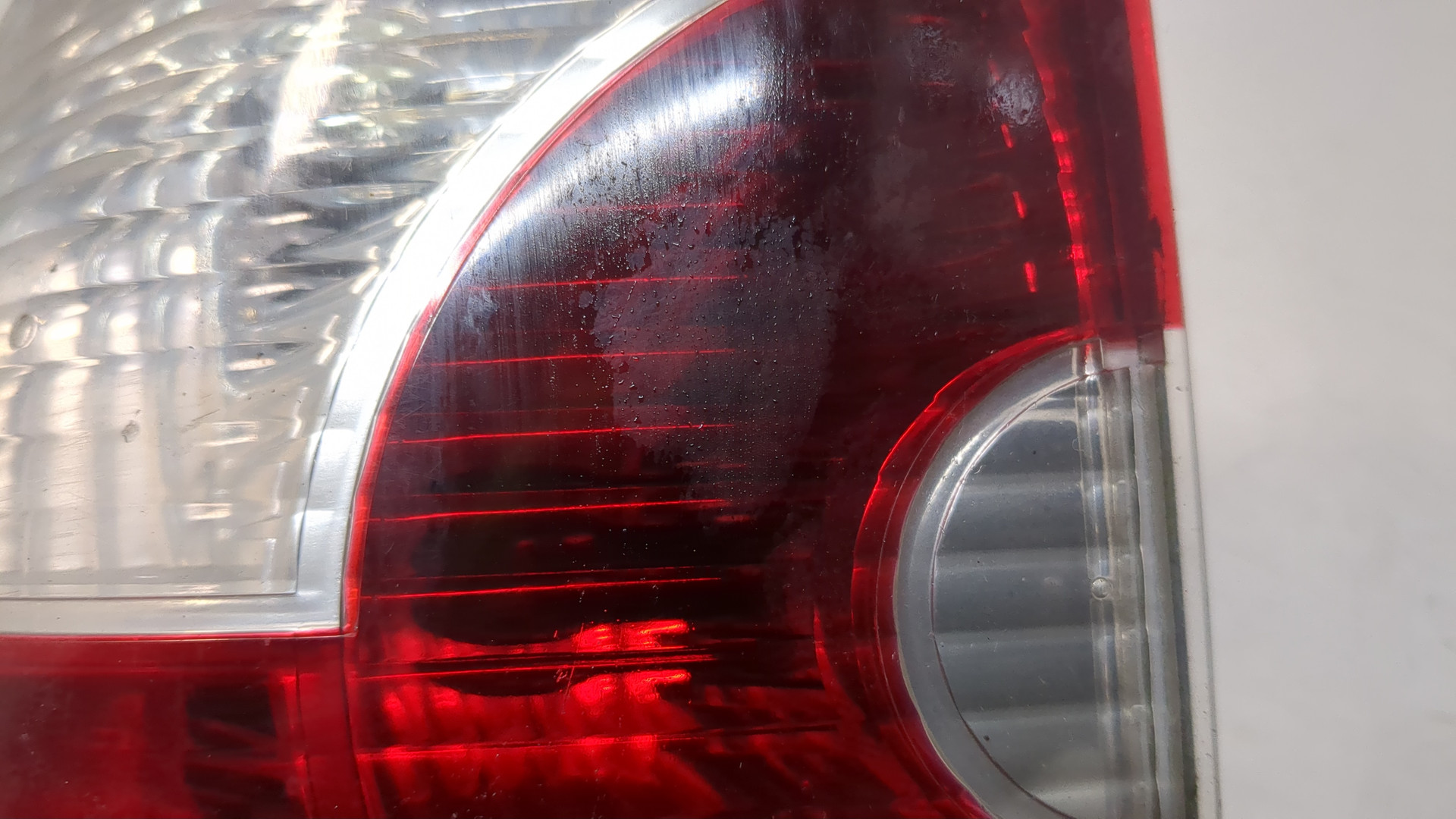 Фонарь задний левый