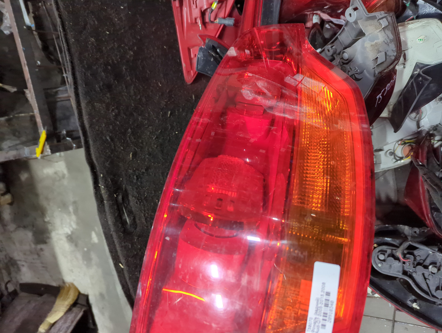 Фонарь задний левый