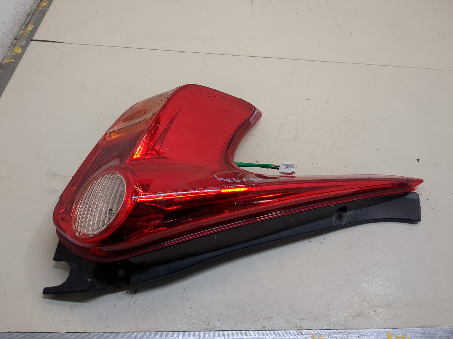 Фонарь задний левый