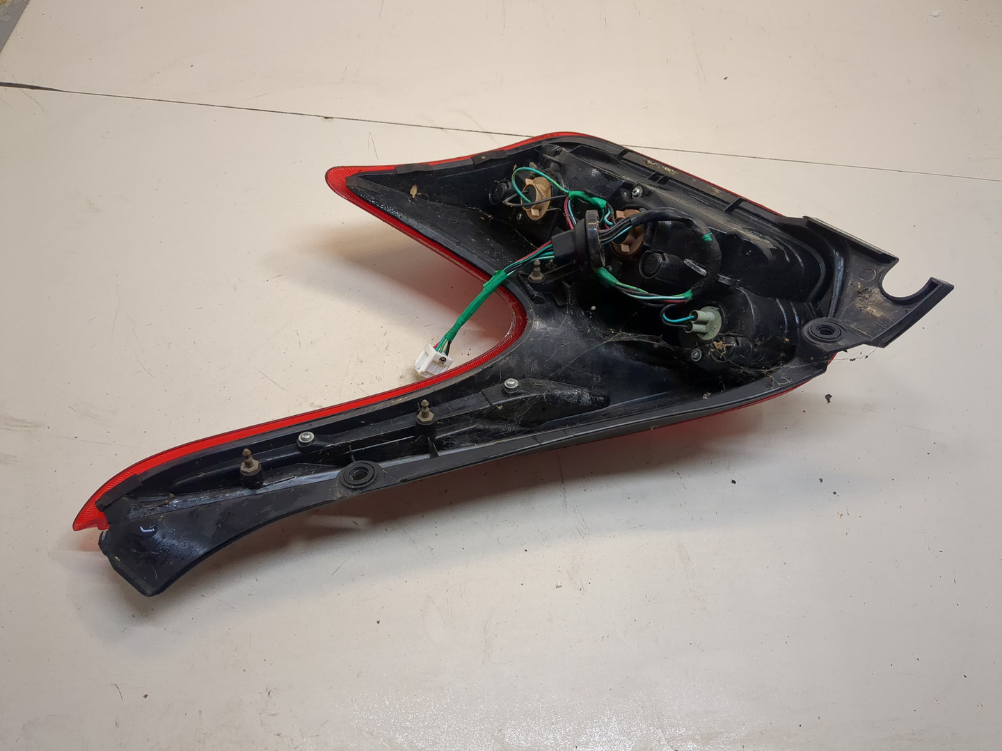 Фонарь задний левый