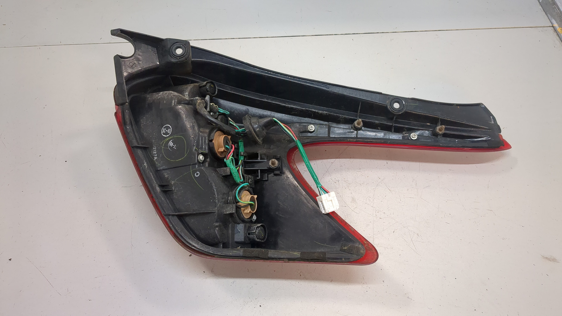 Фонарь задний левый