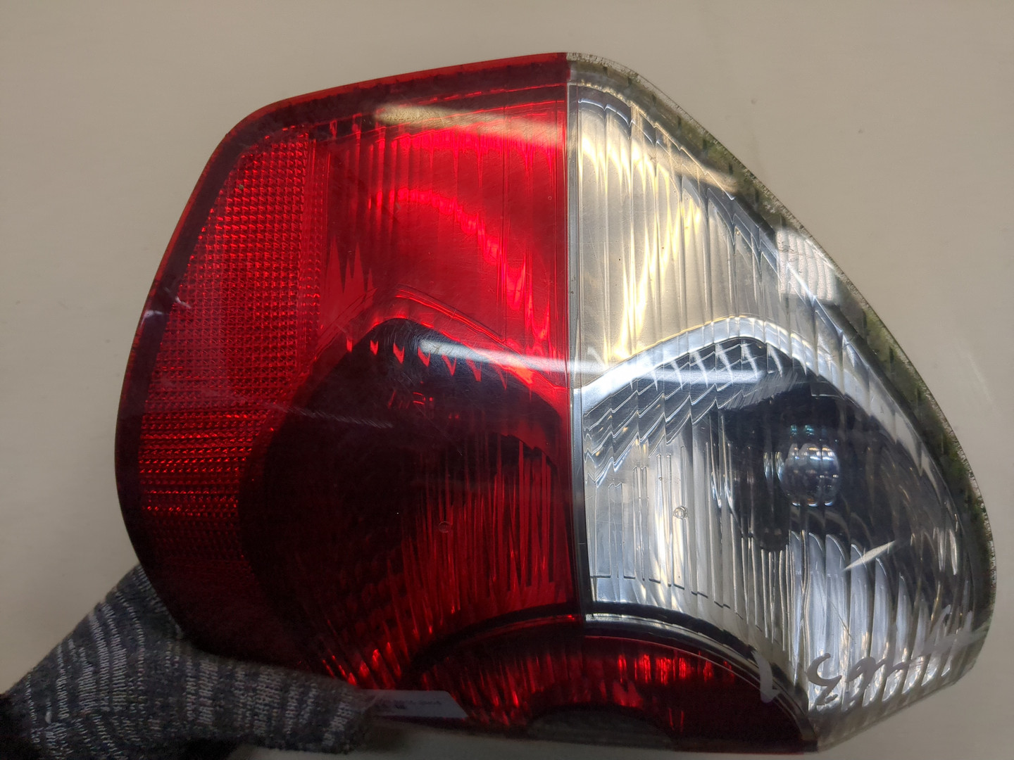 Фонарь задний левый