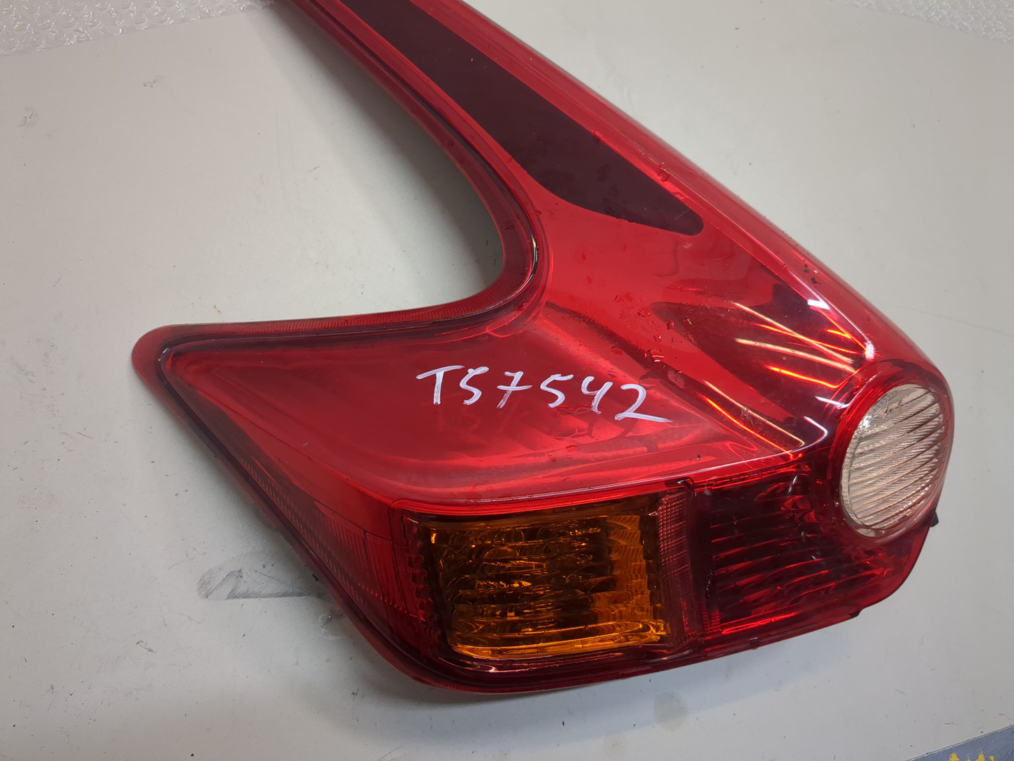 Фонарь задний левый