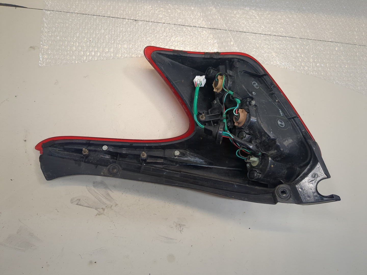 Фонарь задний левый