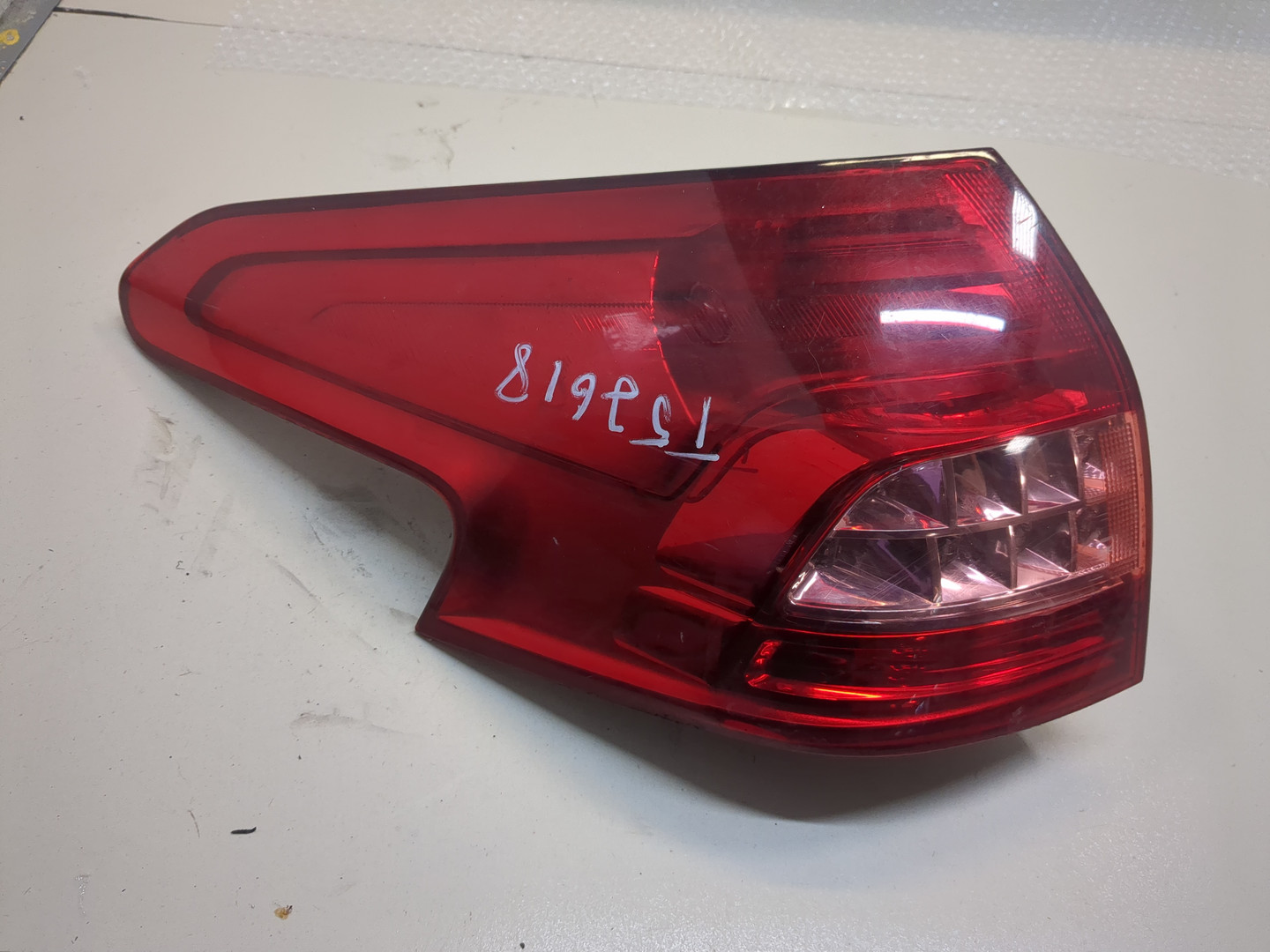 Фонарь задний левый