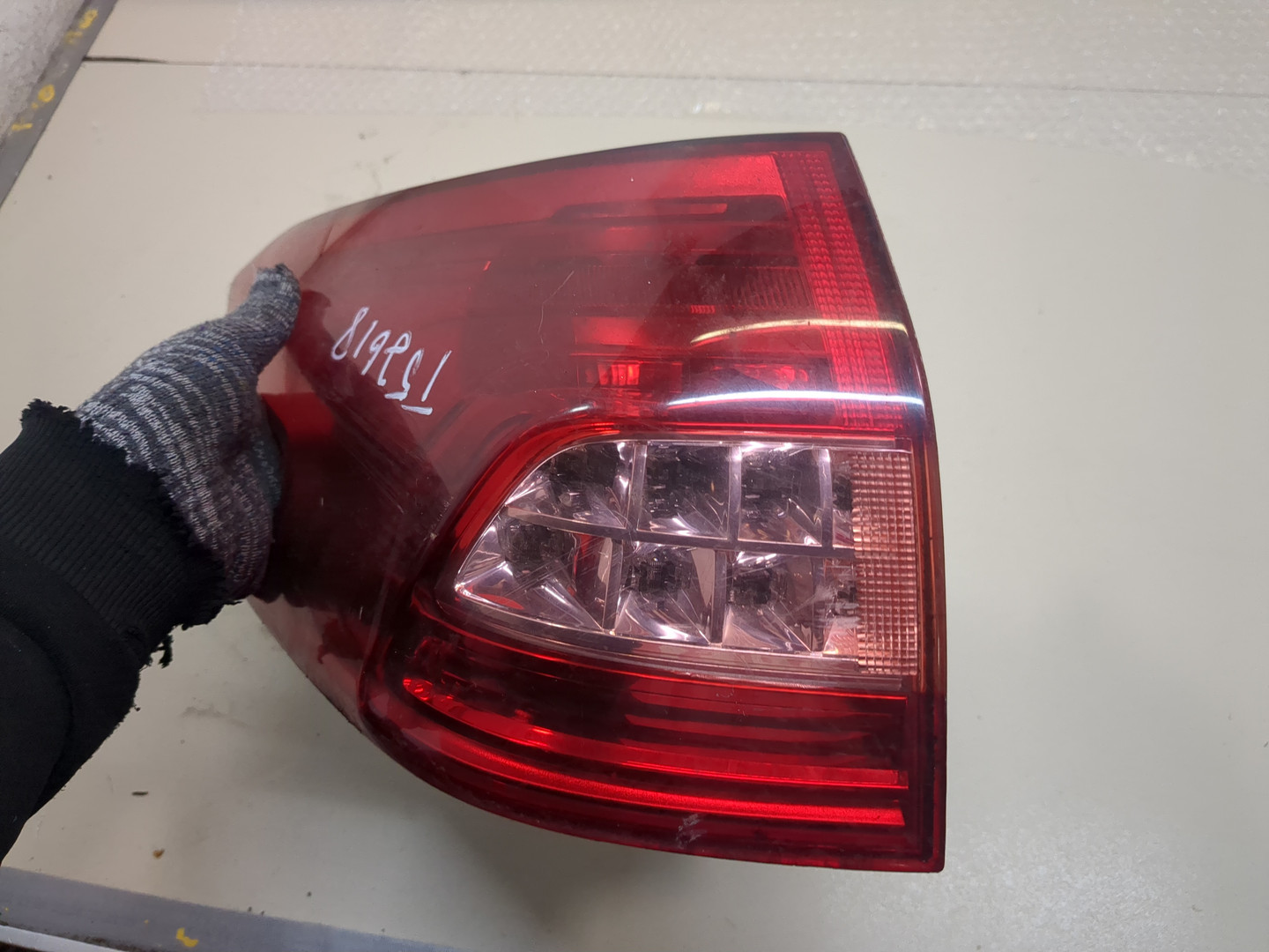 Фонарь задний левый