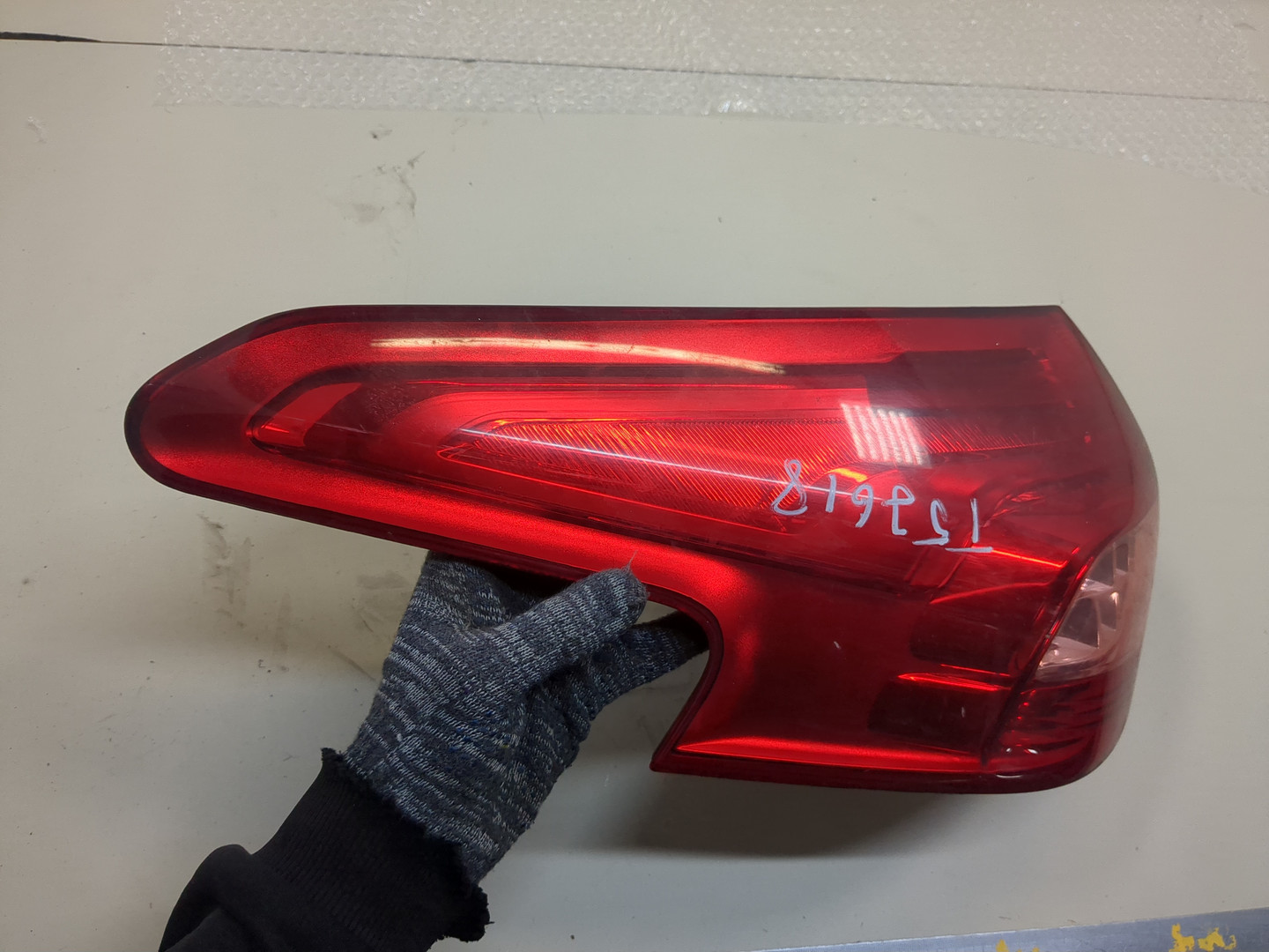 Фонарь задний левый