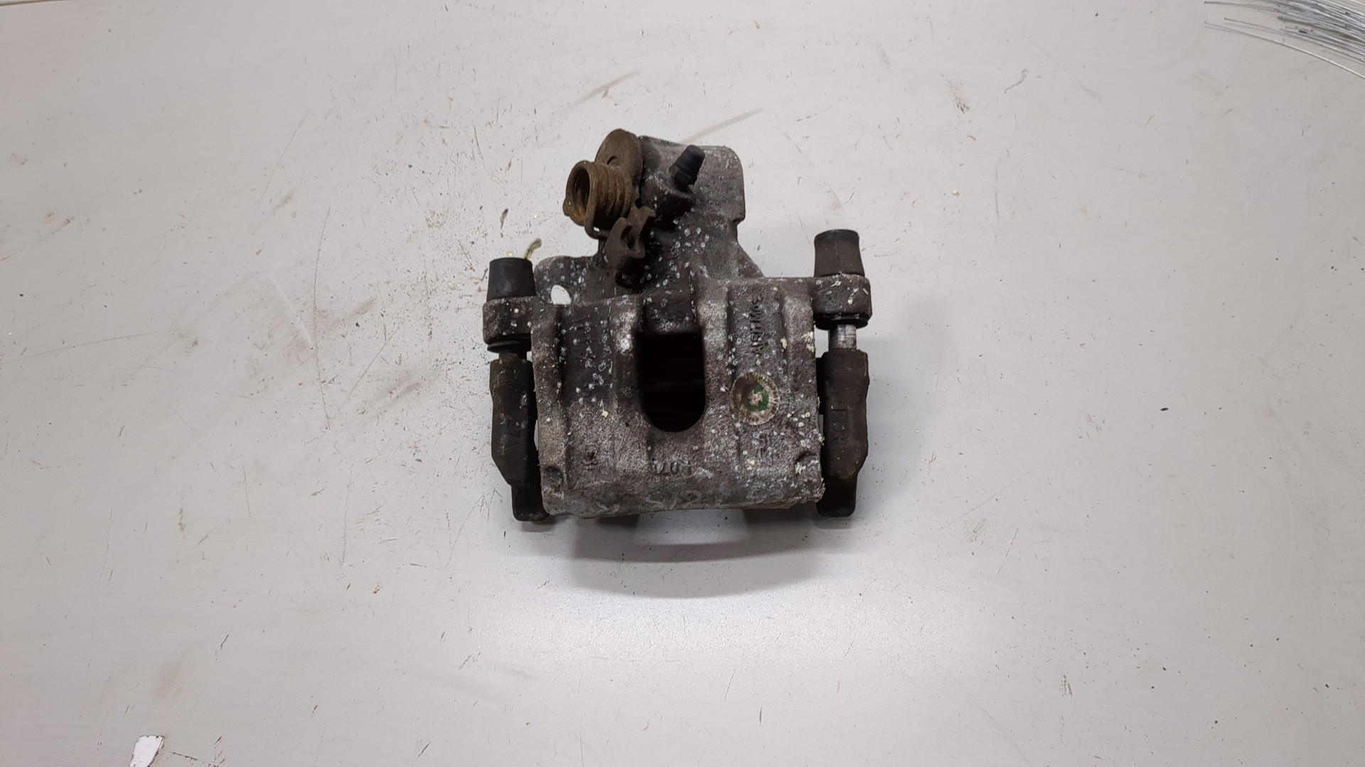 Суппорт задний левый