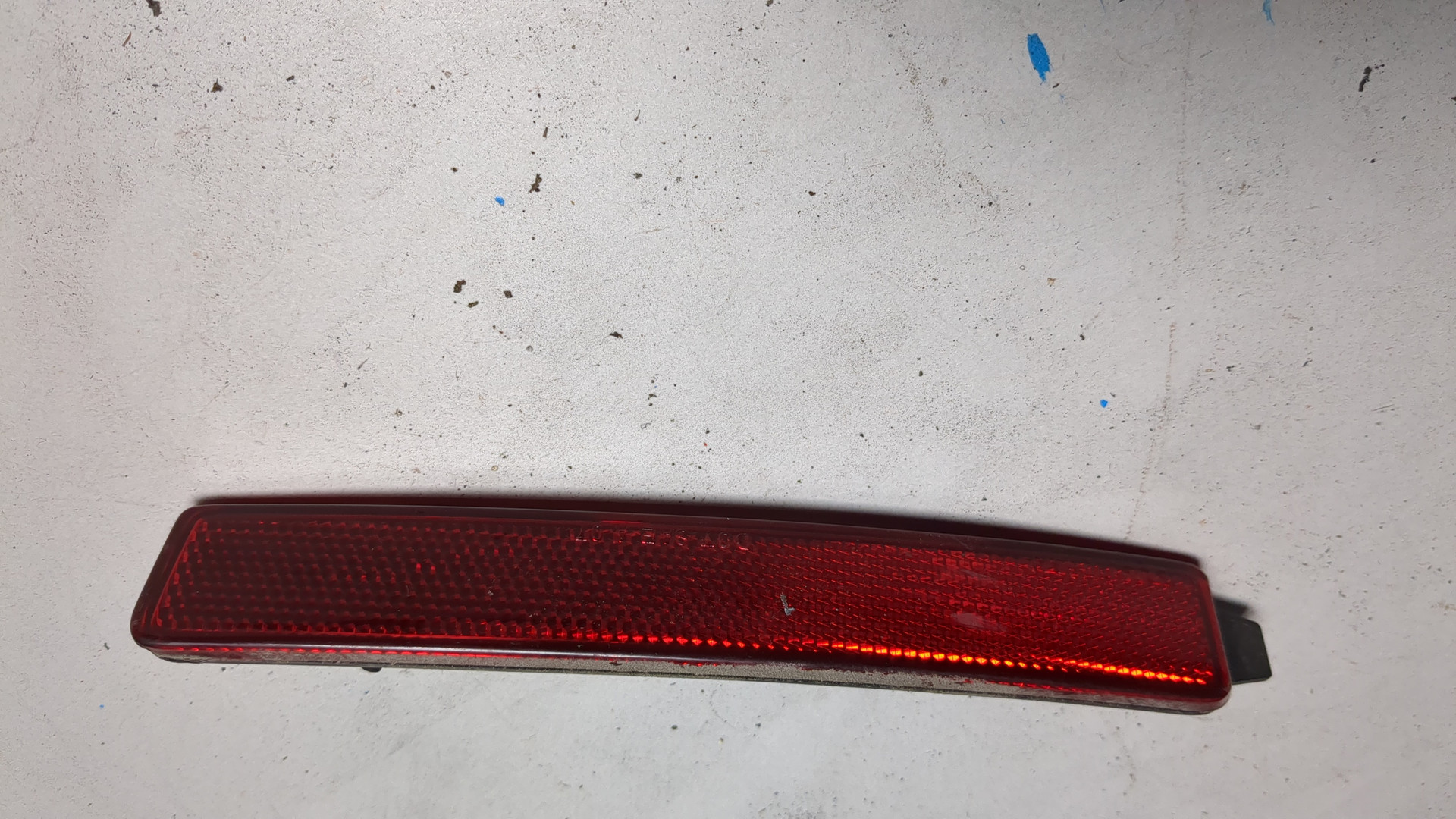 Отражатель в бампер задний левый