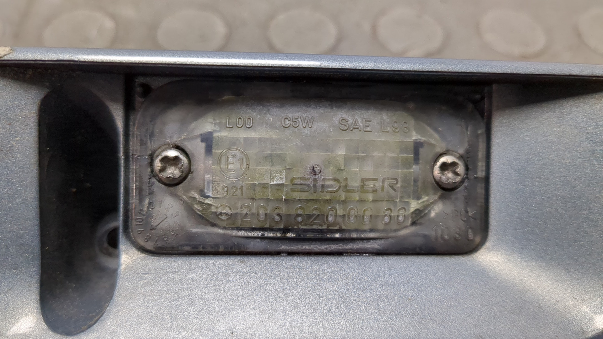 Фонарь подсветки номера