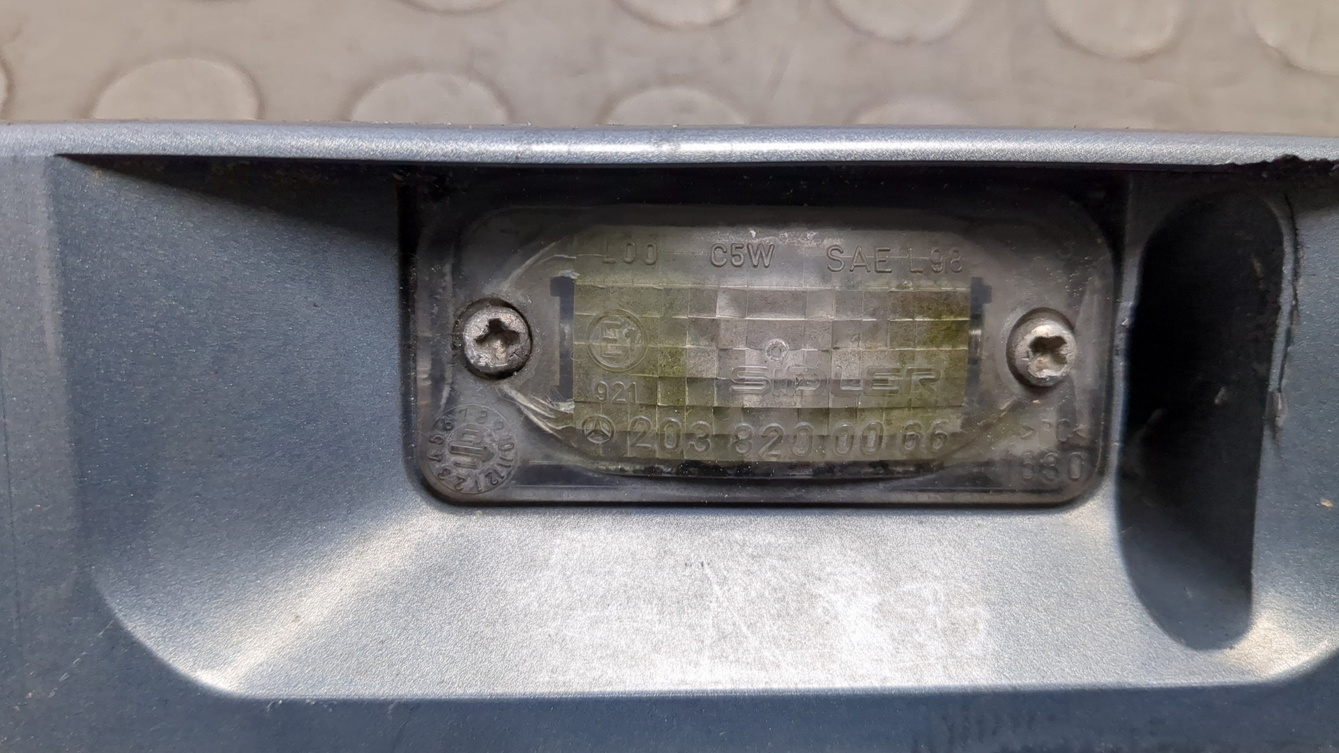 Фонарь подсветки номера