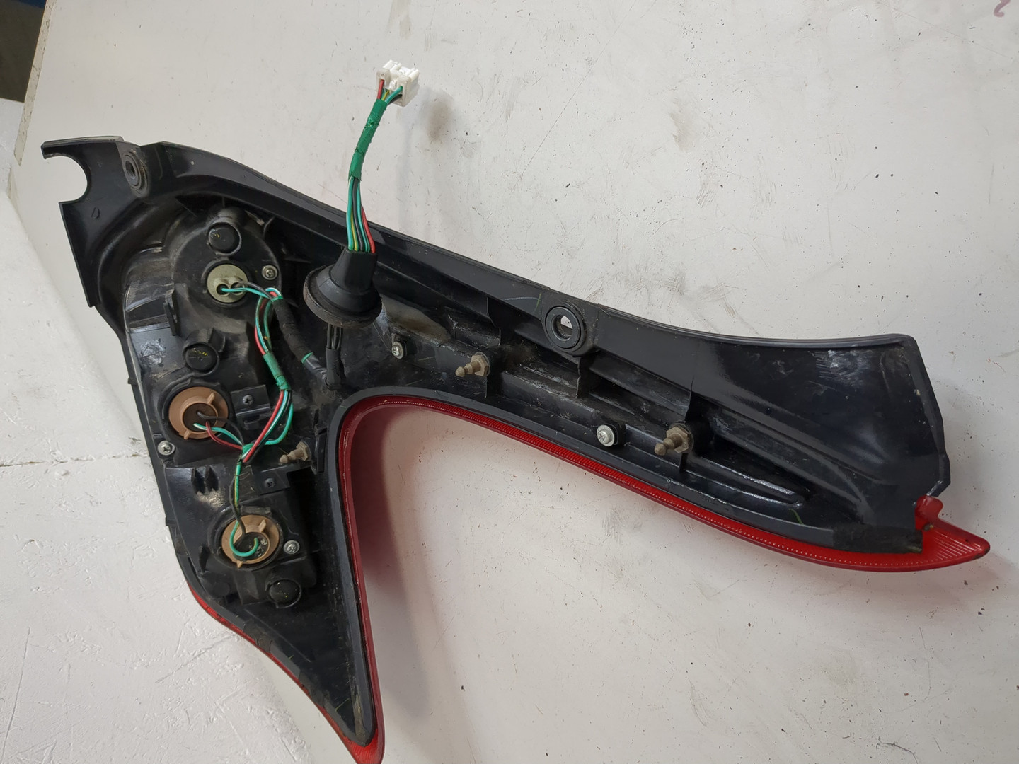 Фонарь задний левый