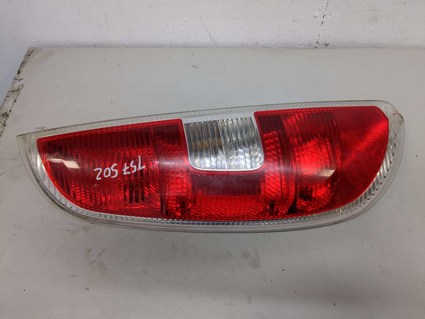 Фонарь задний левый