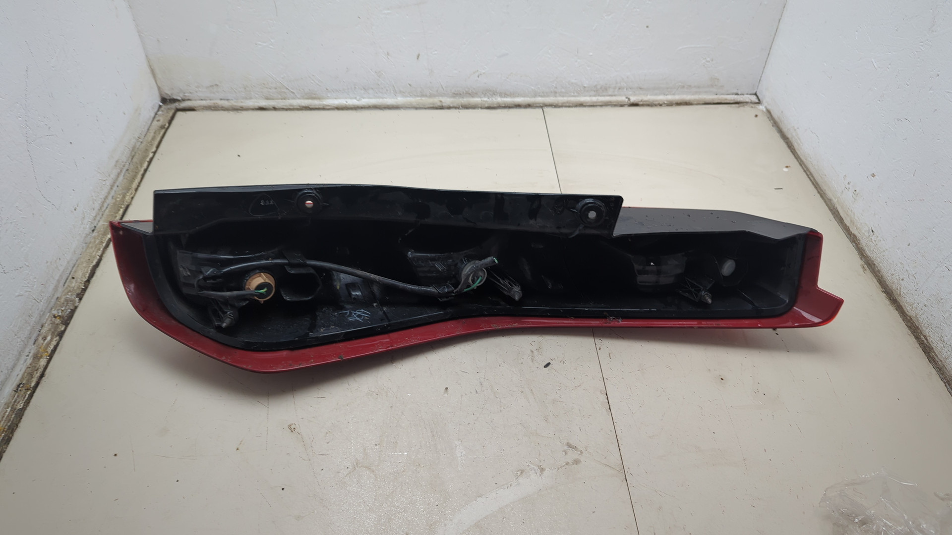 Фонарь задний левый