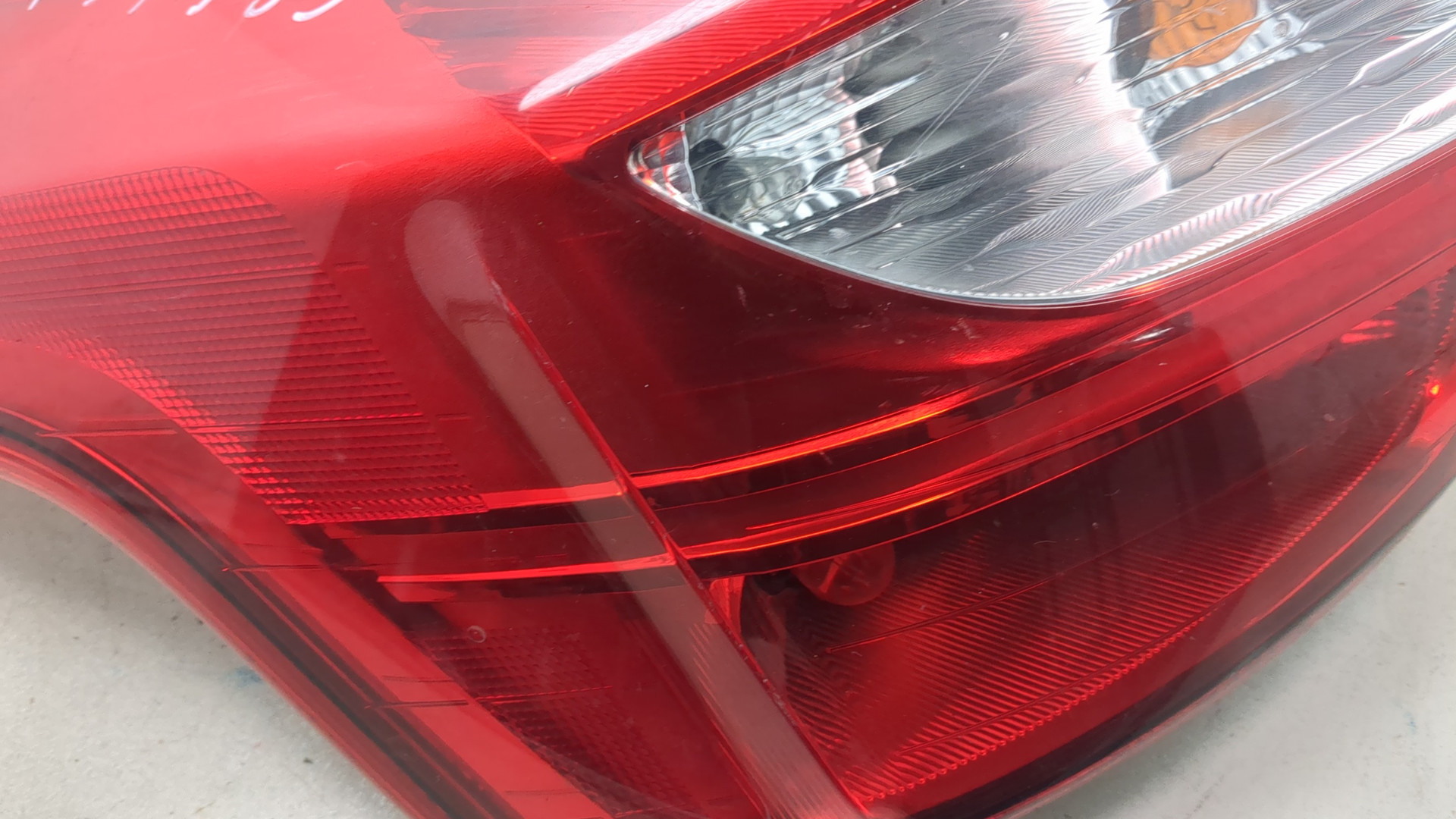 Фонарь задний левый