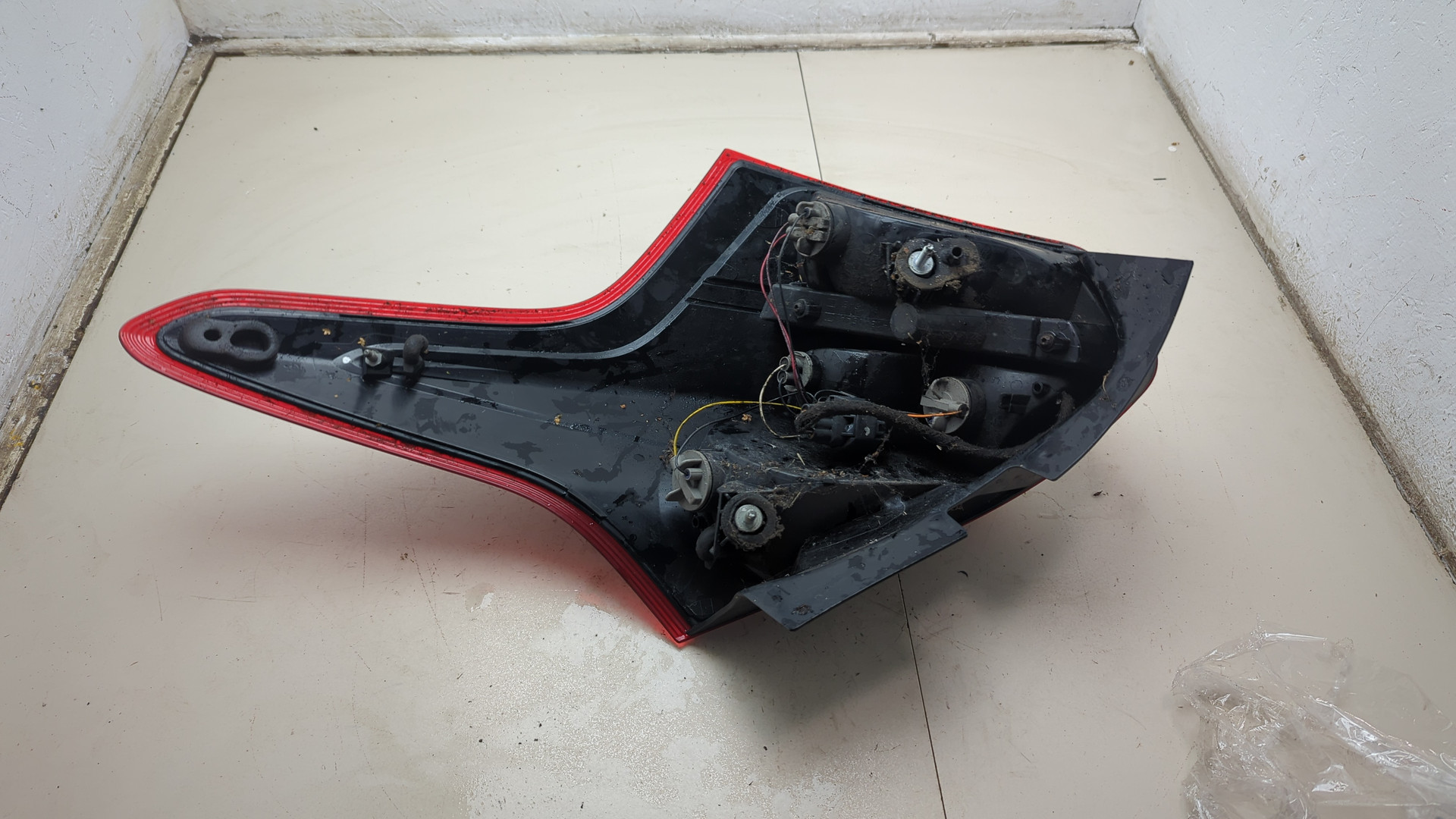 Фонарь задний левый